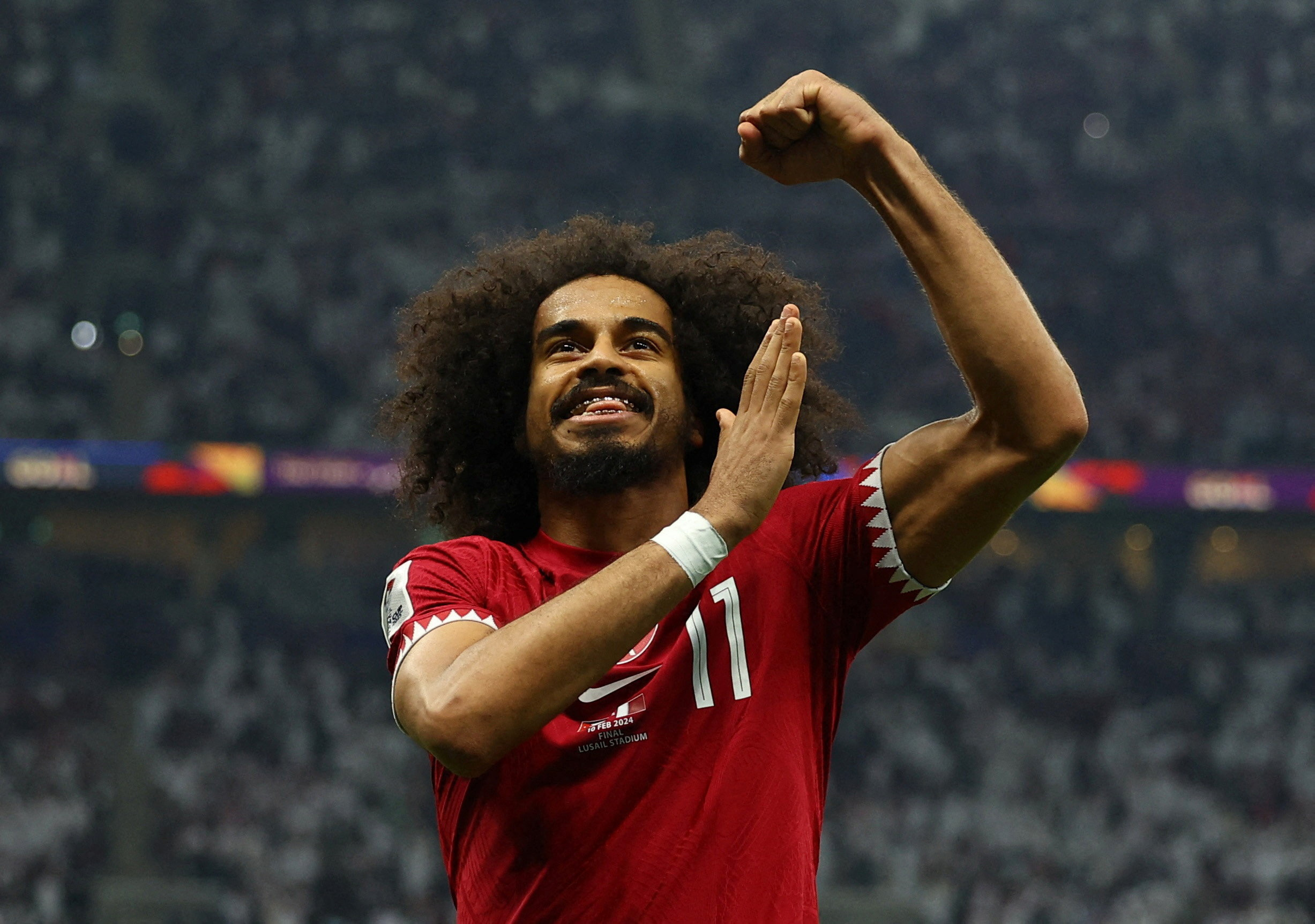 Qatar's Akram Afif celebrates