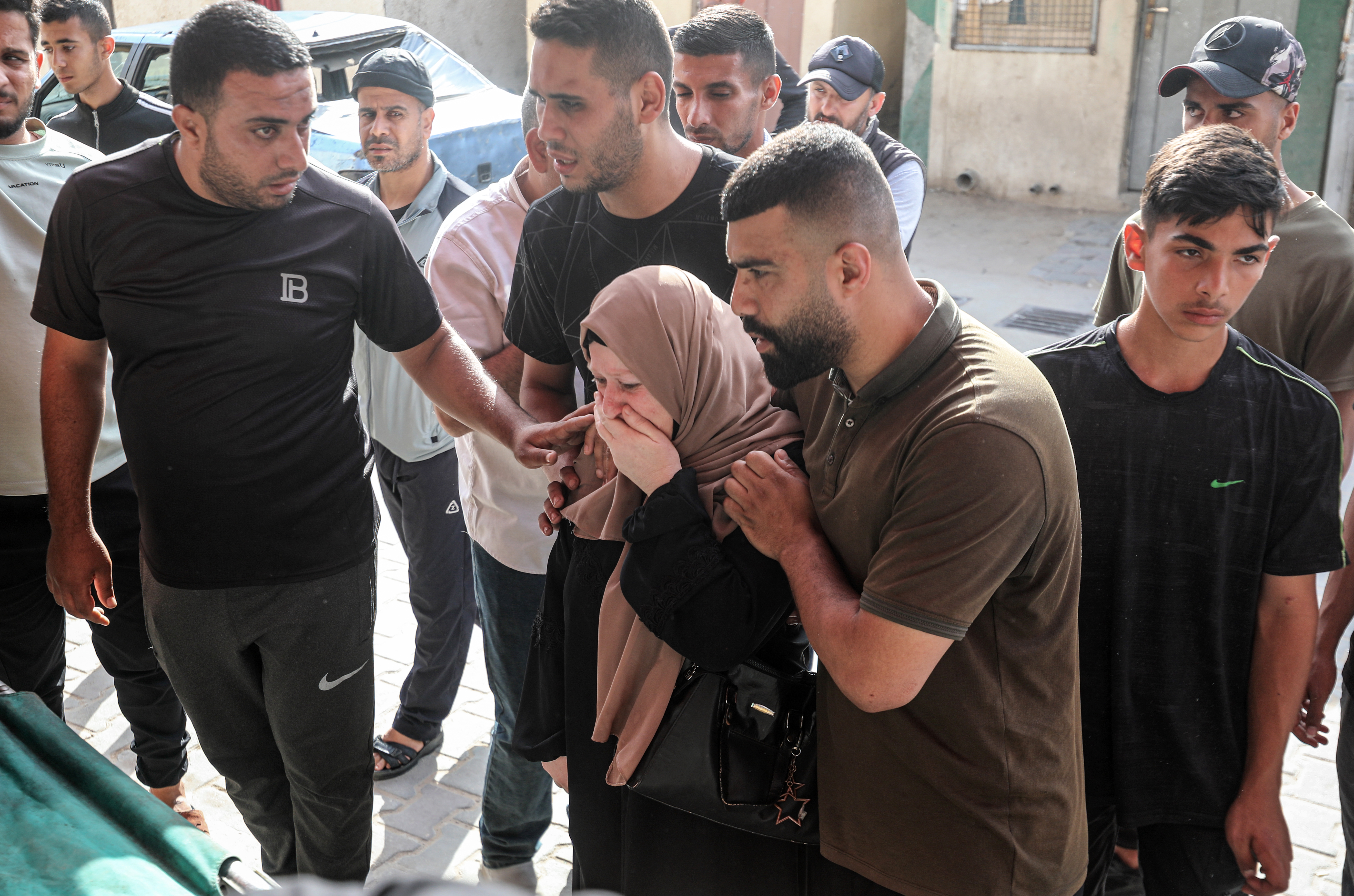 GAZA CITY, GAZA, PALESTINE - JUNE 3: Relatives of two Palestinian siblings, who lost their lives following the Israeli attack on a house at al-Maghazi Refugee Camp, mourn as they attend funeral ceremony on the yard of al-Shifa Hospital in Gaza City, Gaza, Palestine on June 3, 2026. ( Moiz Salhi - Anadolu Agency )