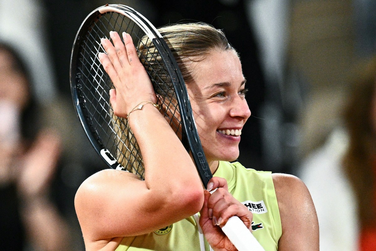 Poland's Maja Chwalinska celebrates after winning against Russia's Diana Shnaider at the end of their women's semi final singles match on day 12 of the French Open