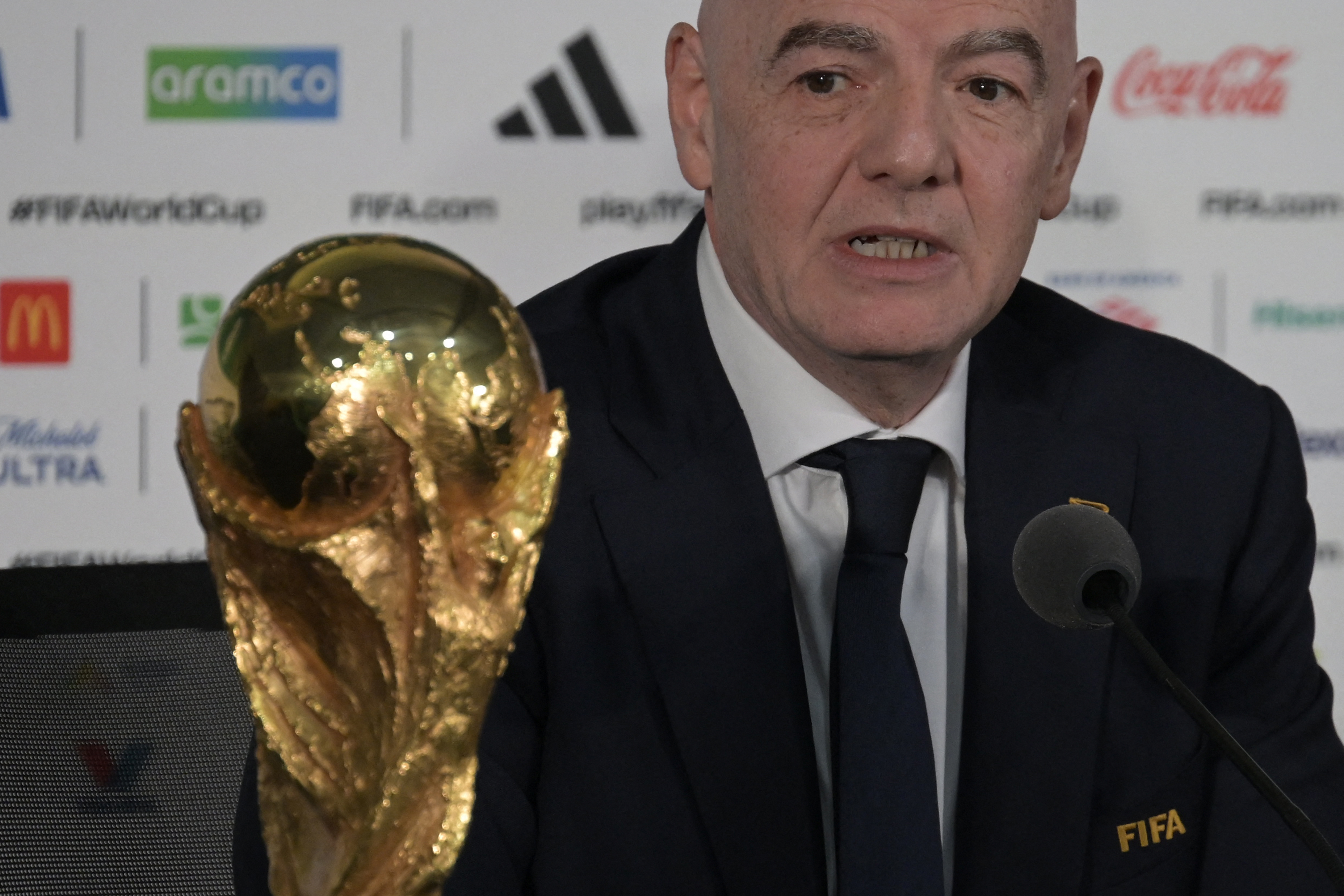 FIFA President Gianni Infantino gives a press conference with the World Cup trophy on the eve of the opening match of the 2026 World Cup football tournament at Mexico city stadium in Mexico City on June 10, 2026. (Photo by Alfredo ESTRELLA / AFP)