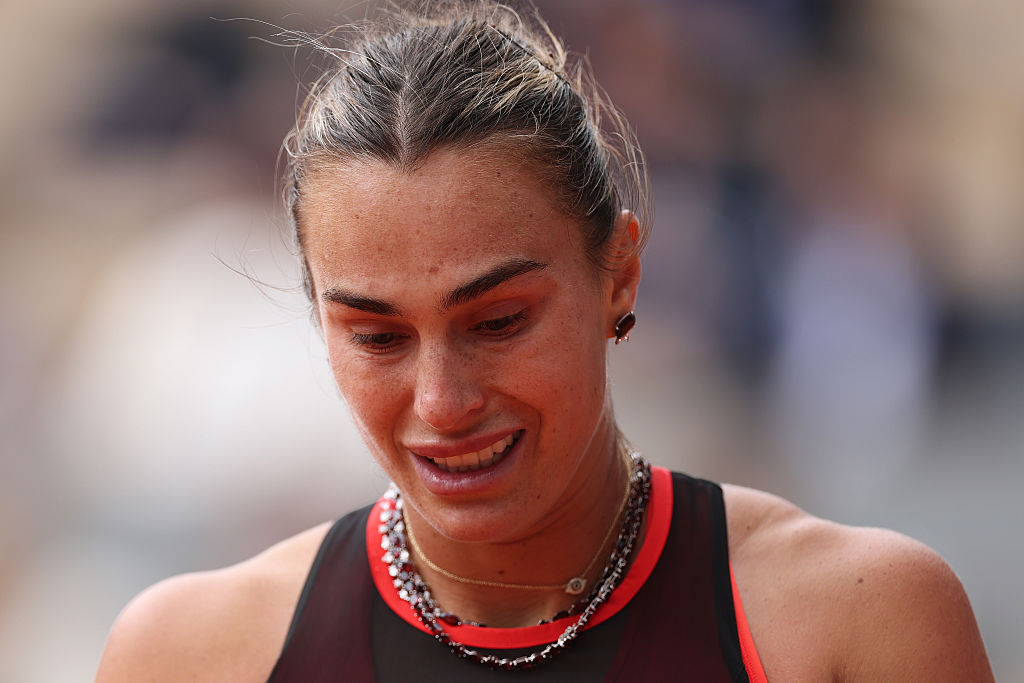 Aryna Sabalenka reacts after losing to Diana Shnaider