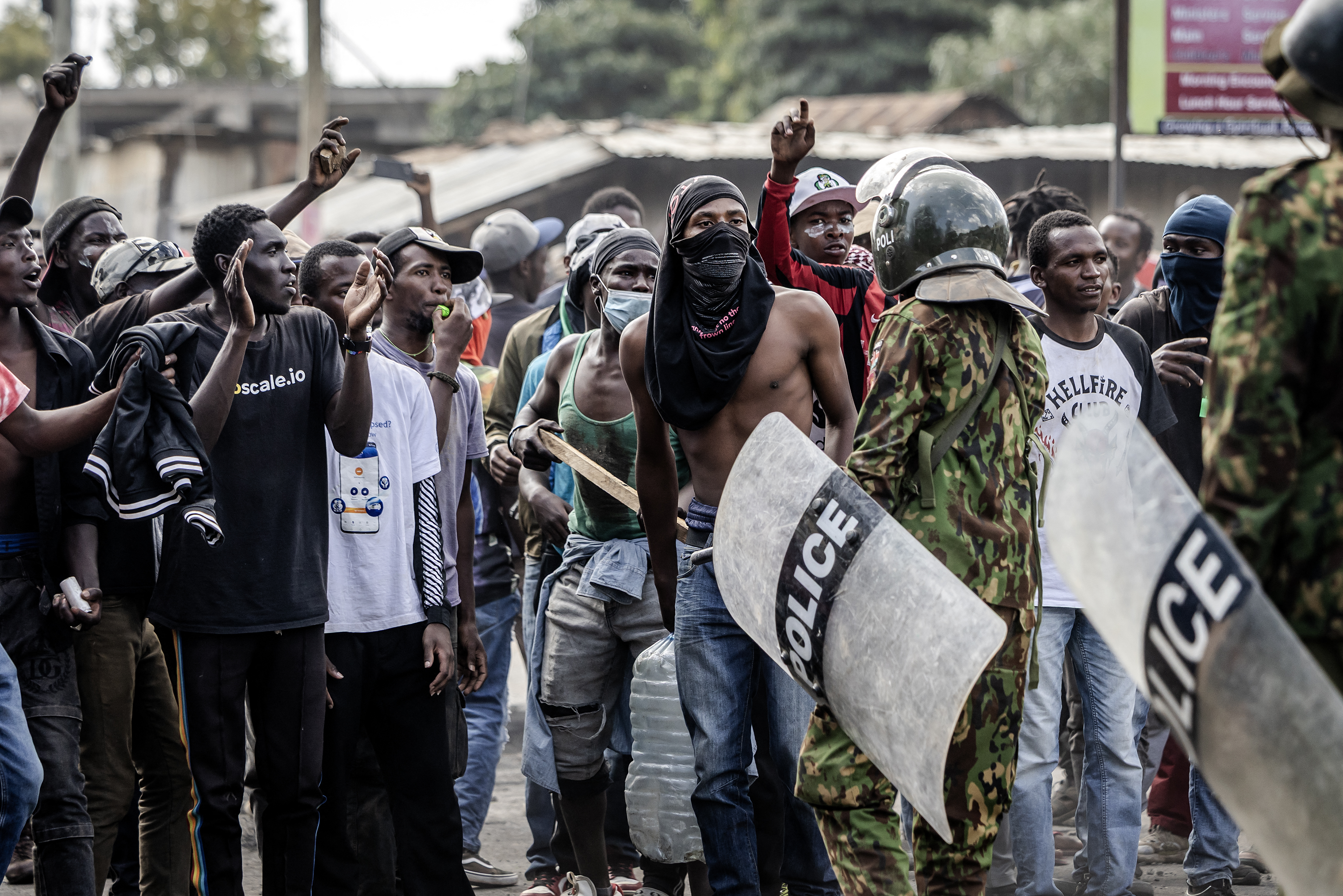 Demonstrators chant slogans as they confront Kenyan police officers during clashes at a demonstration against a controversial US-built Ebola quarantine centre slated to begin operations at Laikipia Air Base in Nanyuki on June 9, 2026.