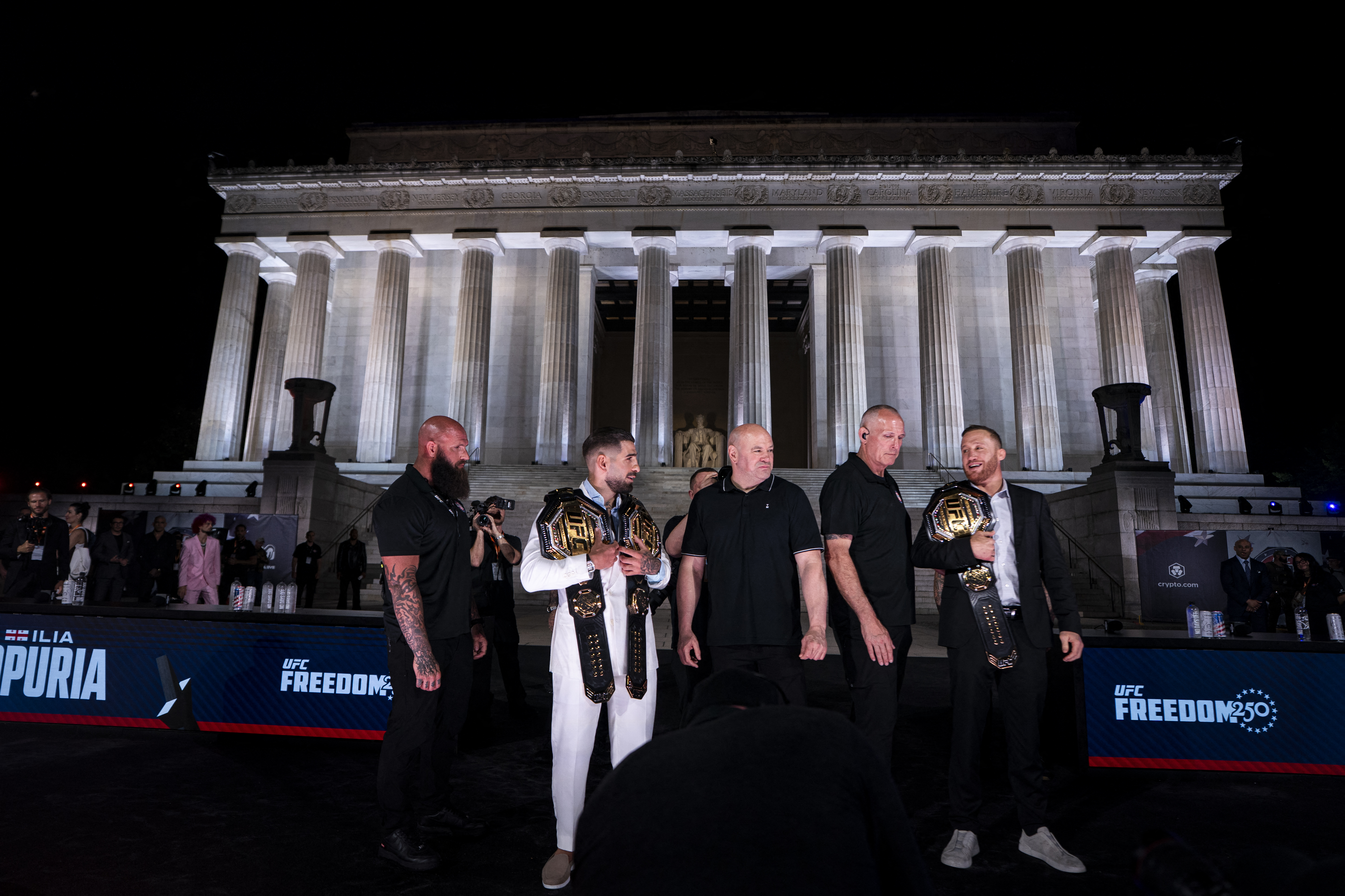 WASHINGTON, DC - JUNE 12: Ultimate Fighting Championship lightweight fighters Ilia Topuria and Justin Gaethje face off with UFC CEO Dana White during a press conference at the Lincoln Memorial ahead of the upcoming UFC Freedom 250 fight on the South Lawn of the White House on June 12, 2026 in Washington, DC. UFC Freedom 250 will take place this Sunday, June 14th. Al Drago/Getty Images/AFP (Photo by Al Drago / GETTY IMAGES NORTH AMERICA / Getty Images via AFP)