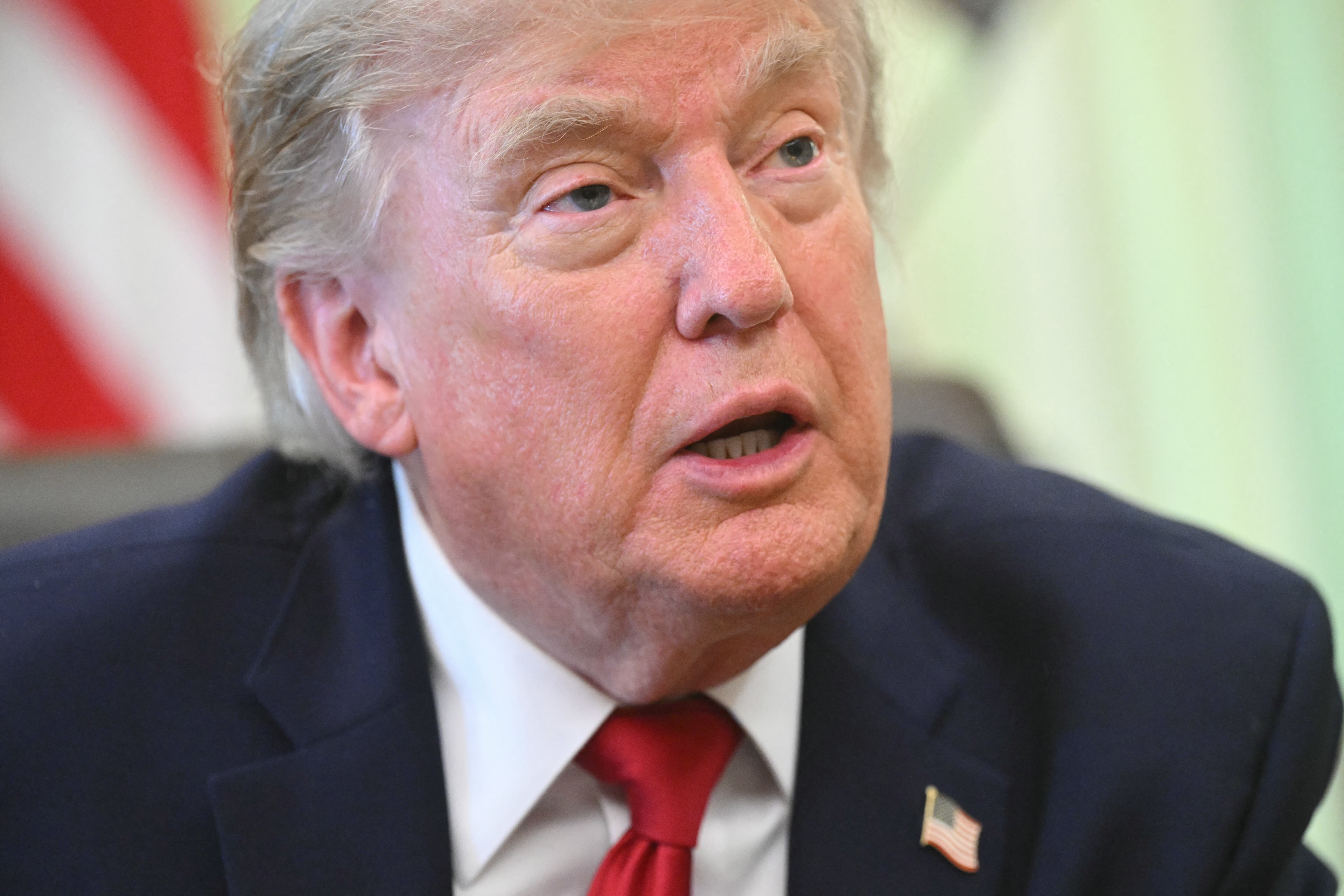 US President Donald Trump speaks with reporters after signing a presidential memo on pollution control in vehicles at the Oval Office of the White House in Washington, DC, on June 29, 2026. (Photo by SAUL LOEB / AFP)