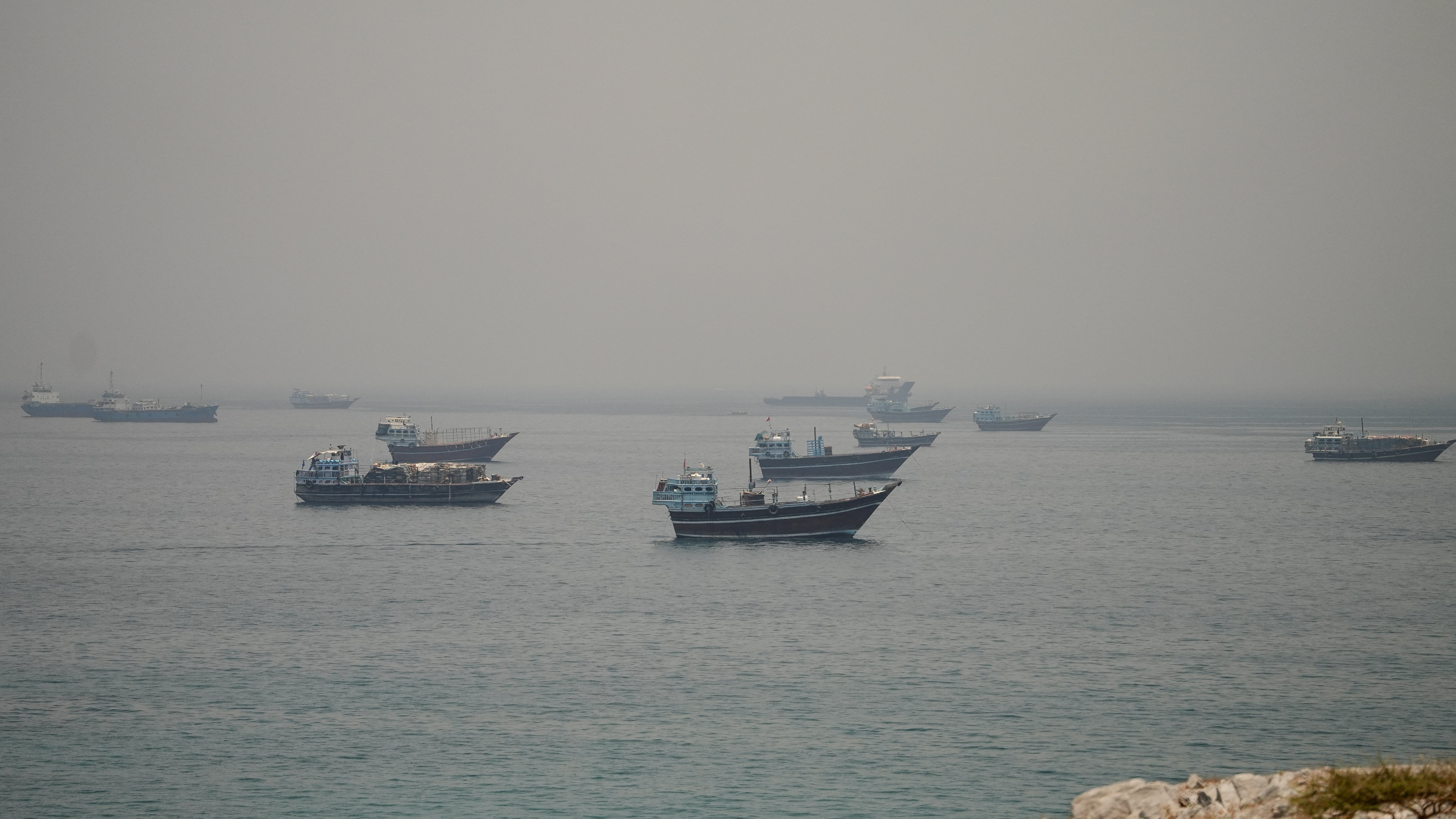 Vessels are anchored in the Strait of Hormuz, as seen from Musandam, Oman, June 11, 2026. REUTERS/Stringer