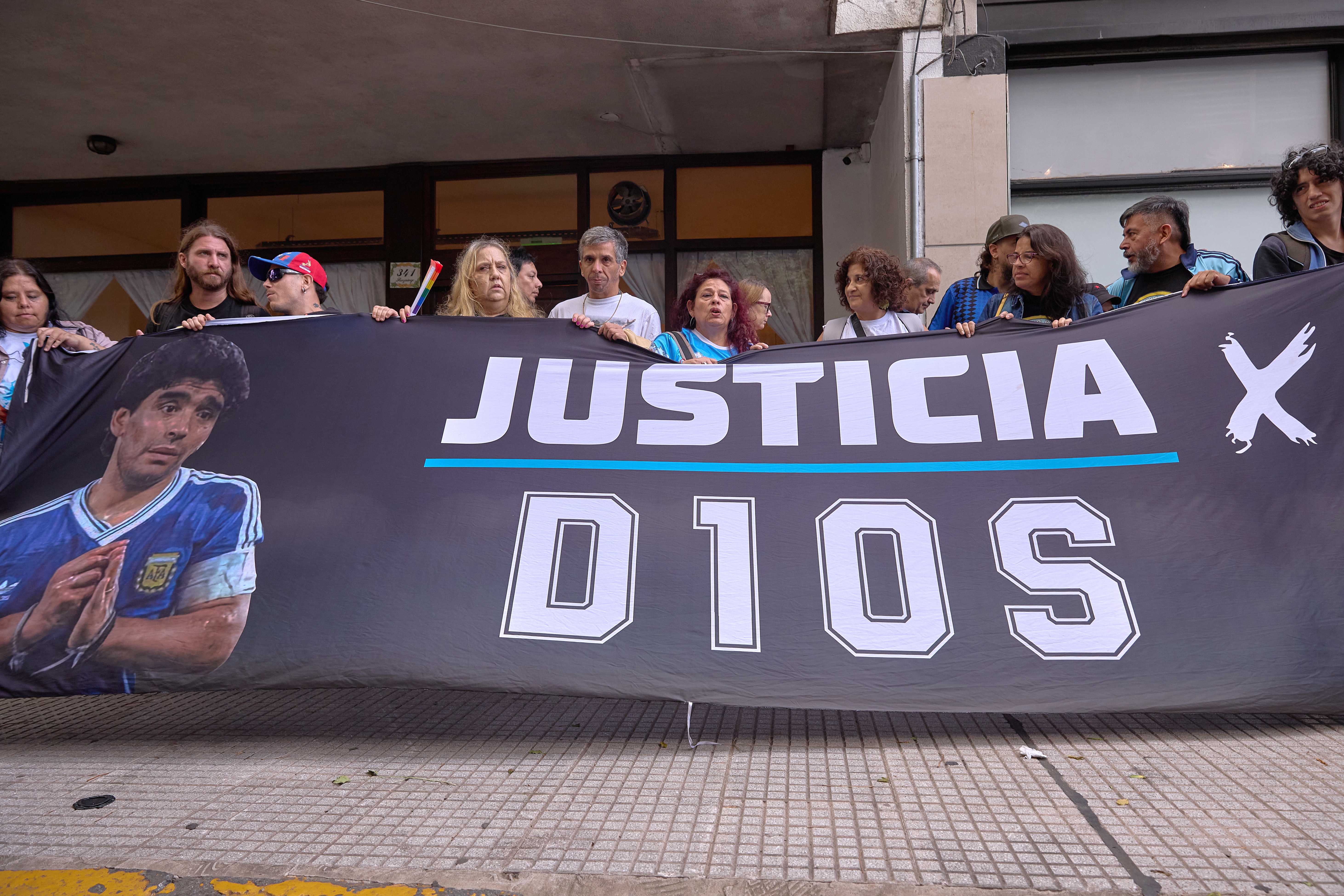 Supporters of Diego Armando Maradona demonstrate outside the San Isidro courthouse in Buenos Aires, Argentina, during the second trial concerning his death