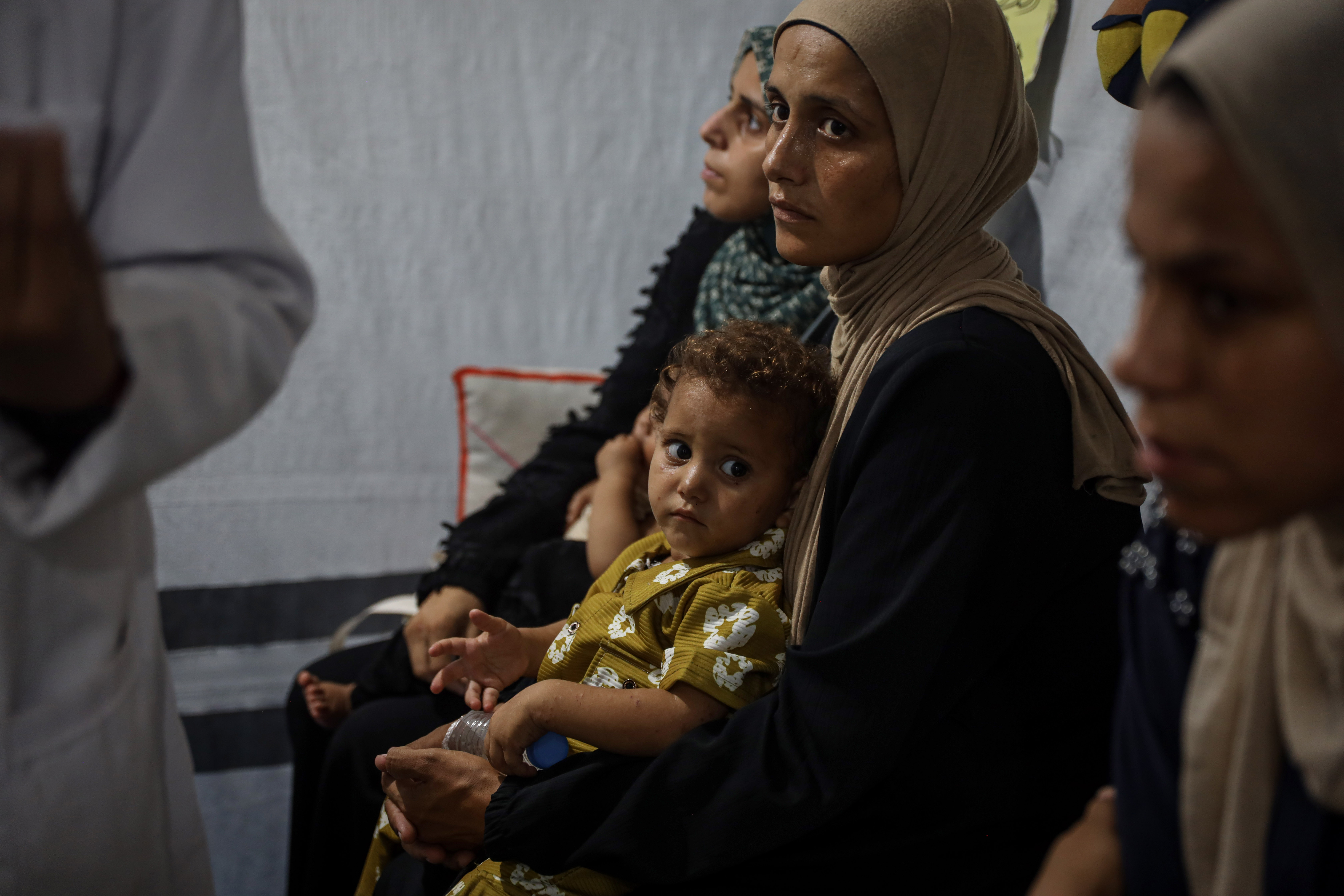 Displaced mothers in Gaza face breastfeeding challenges amid displacement, psychological stress and poor nutrition [Abdelhakim Abu Riash/ Al Jazeera]