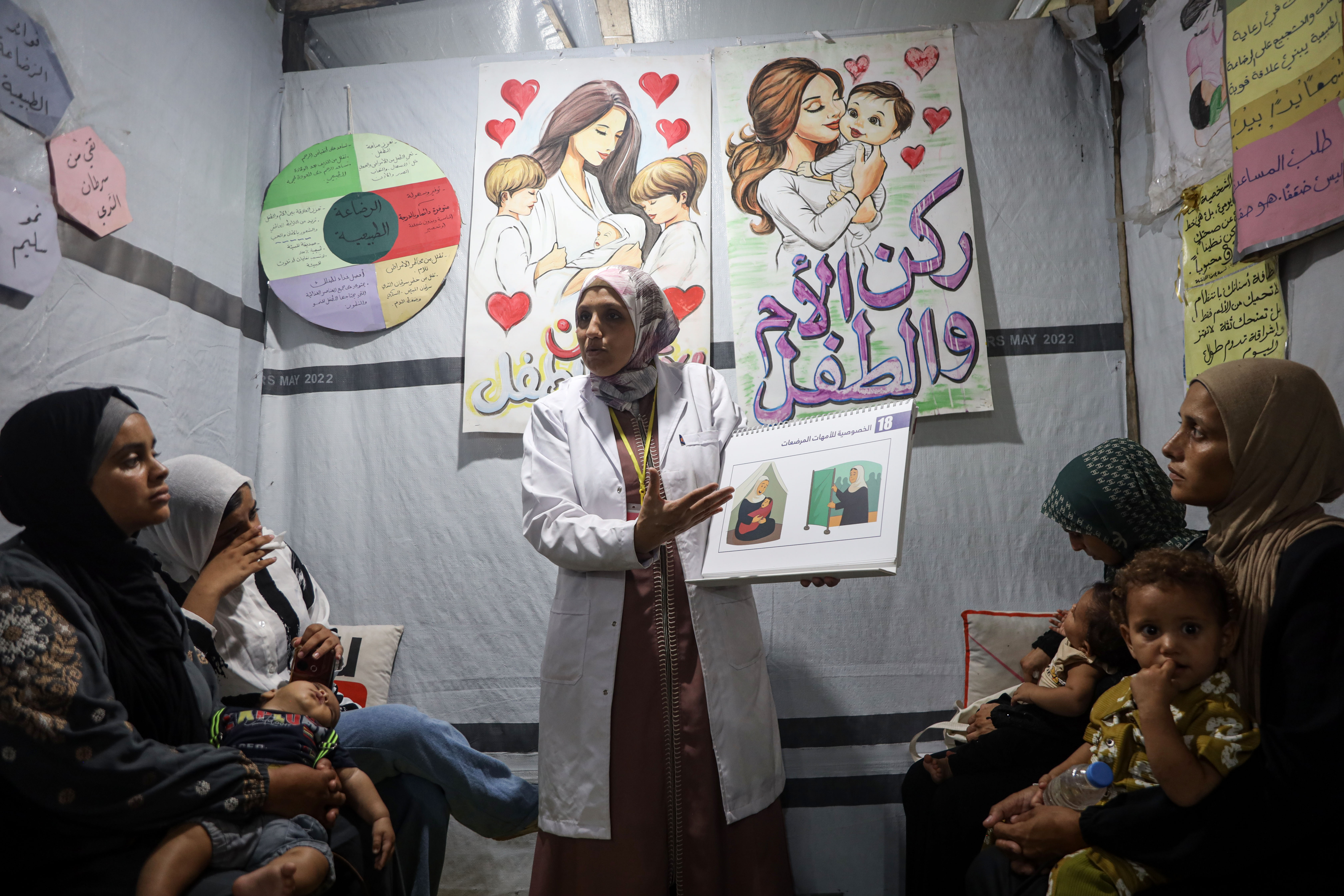 Iman Abu Ouda, a breastfeeding specialist, supports displaced mothers facing the challenges of breastfeeding during the war [Abdelhakim Abu Riash/ Al Jazeera]