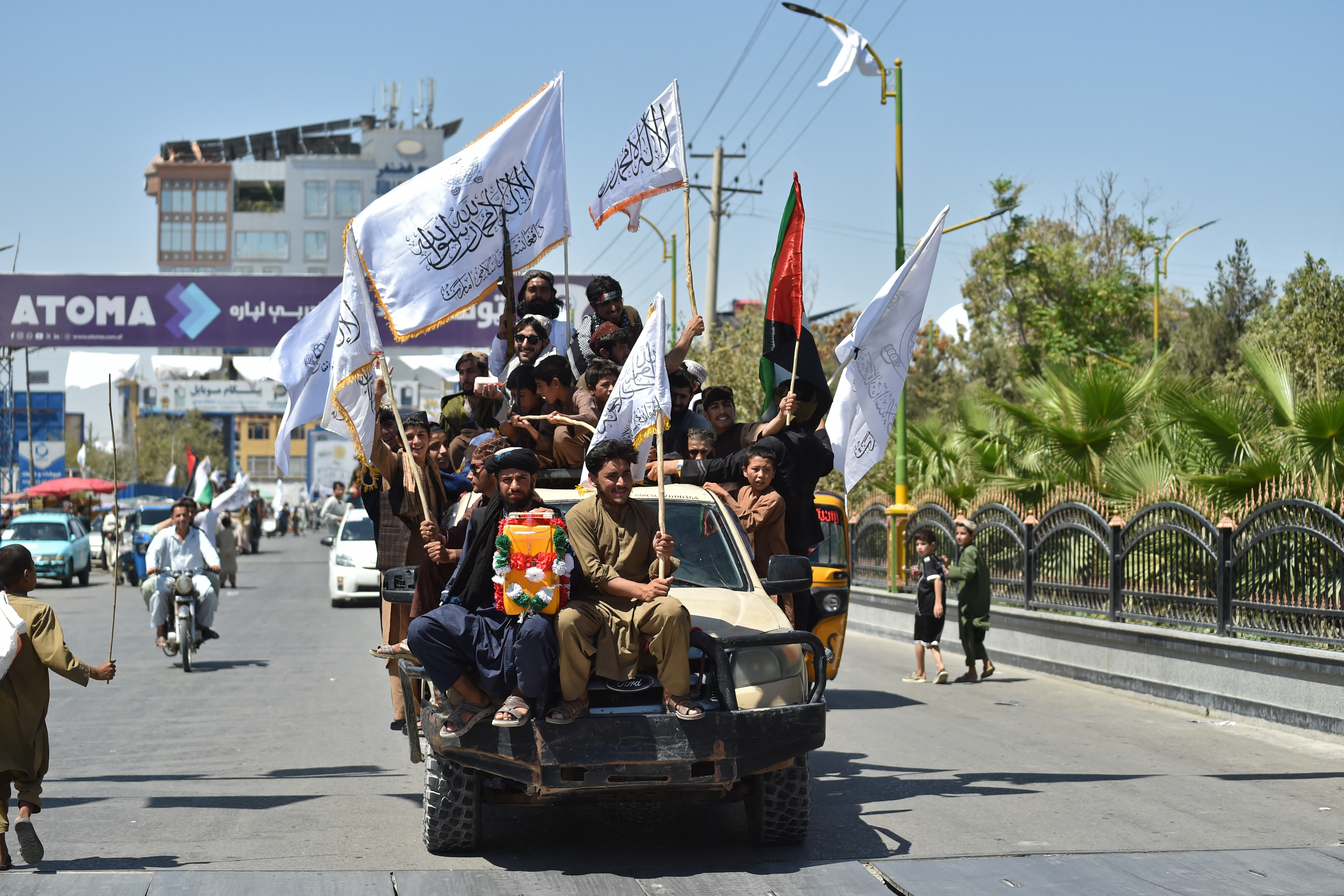 Patriotic music and flags mark Taliban rule anniversary in Kabul
