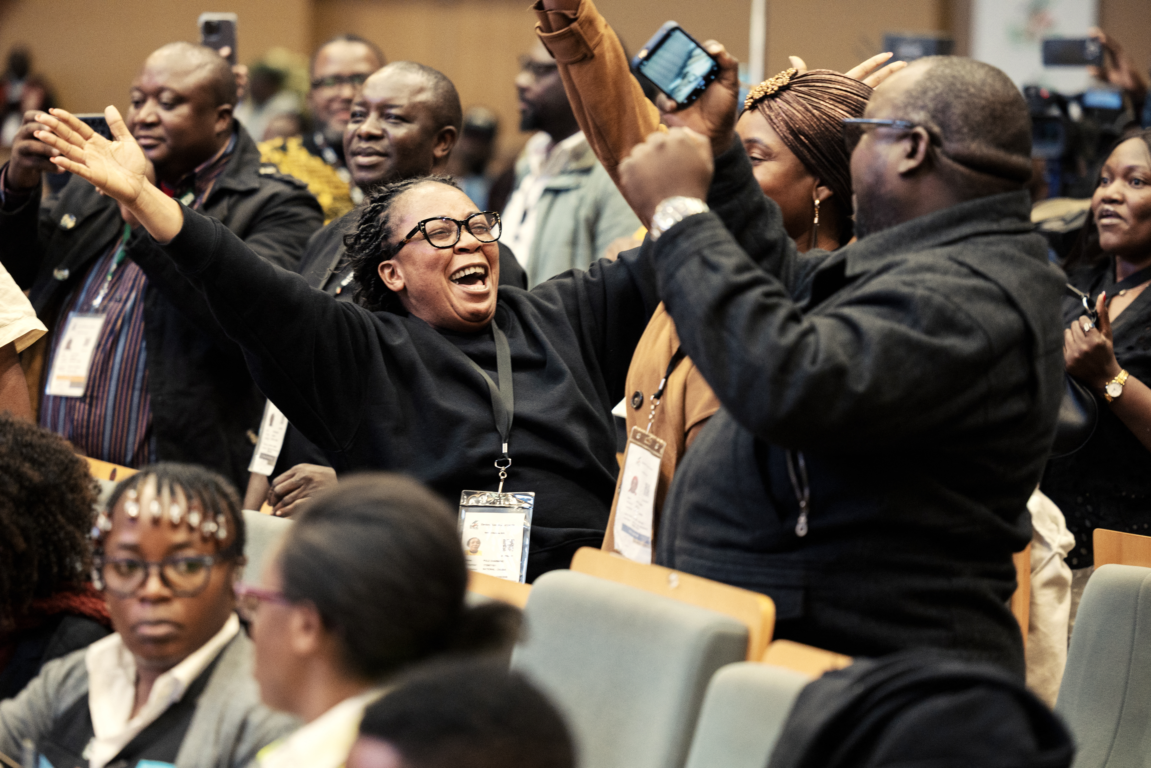 Supporters of Zambian President Hakainde Hichilema celebrate his re-election in Lusaka on August 18, 2026, after the Electoral Commission of Zambia announced the results [Gianluigi Guercia/AFP]