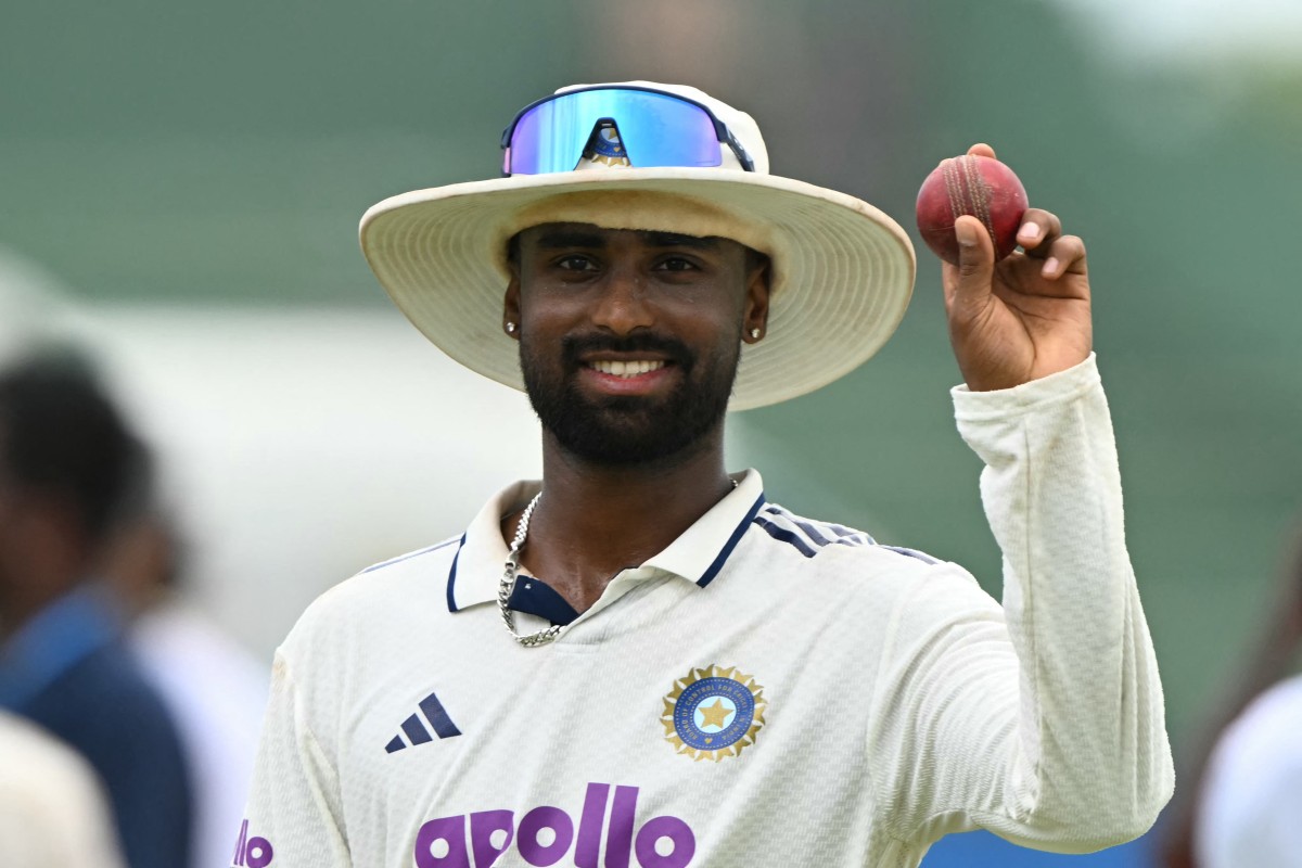 India's Manav Suthar shows the ball after taking a six-wicket haul in Galle