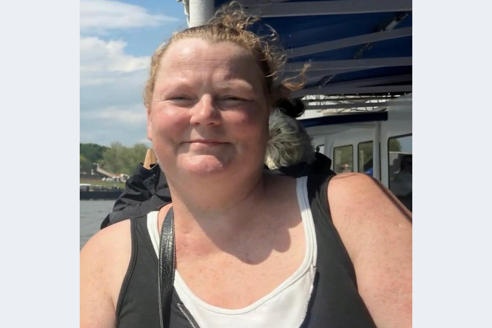 A woman smiles