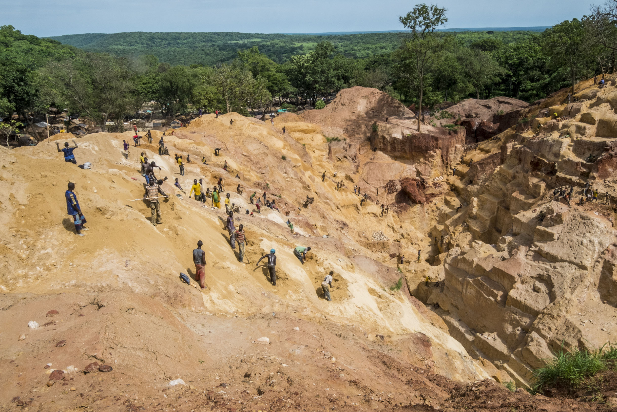 Gold miners in a mine.