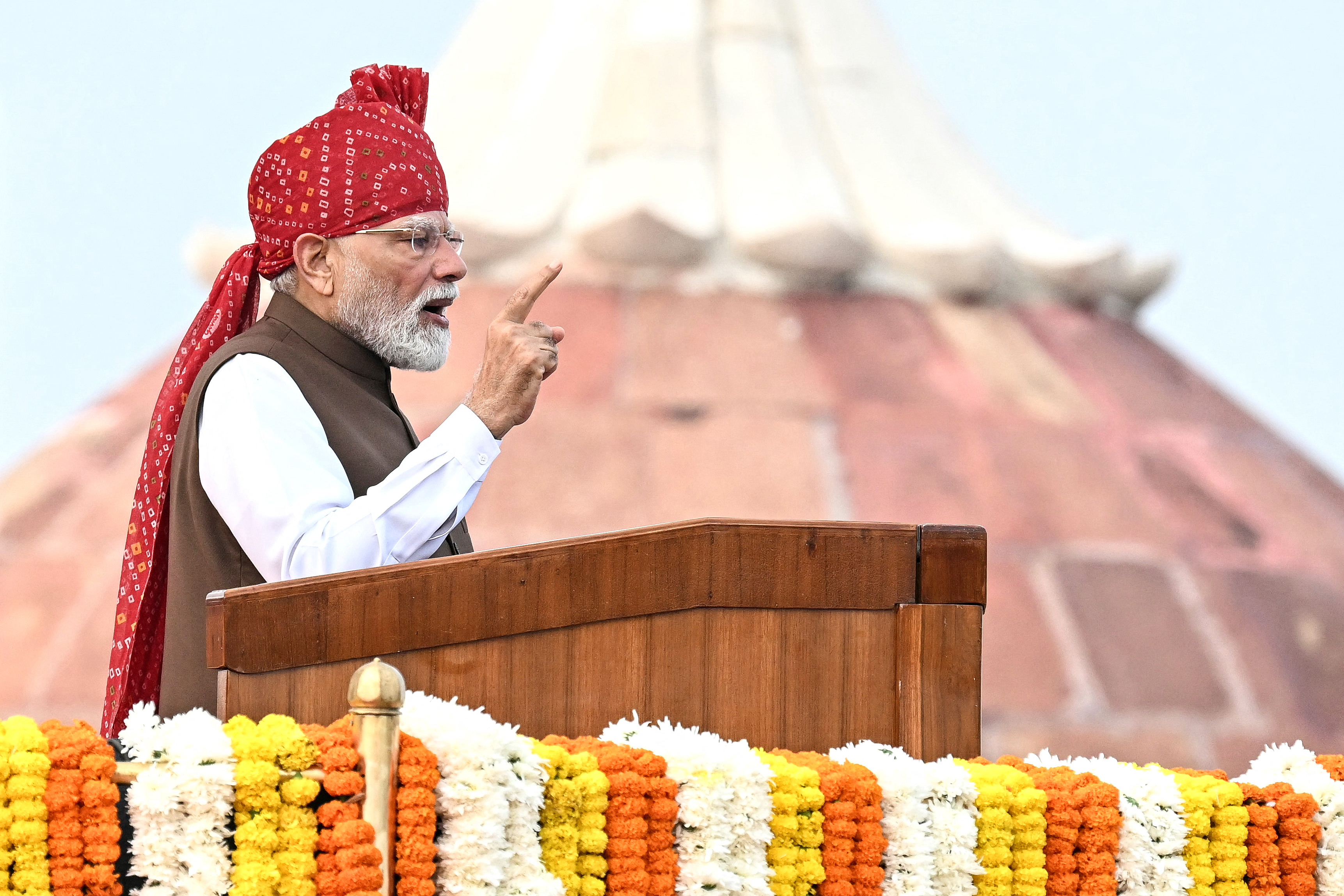 India's Prime Minister Narendra Modi addresses the nation from the ramparts of the Red Fort during the celebrations to mark country's Independence Day in New Delhi on August 15, 2026. (Photo by Sajjad HUSSAIN / AFP)