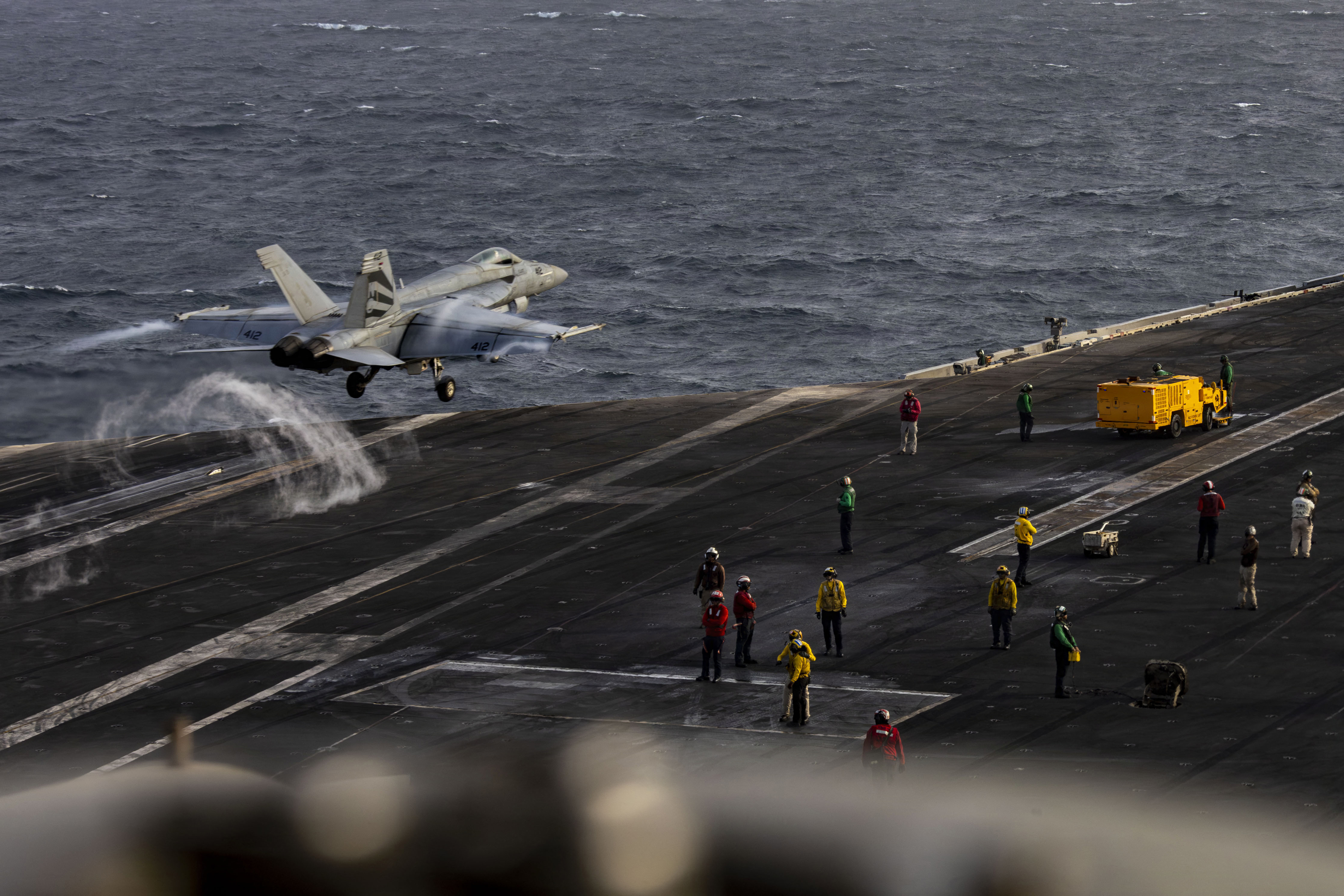 (FILES) This US Navy handout photograph released on August 4, 2026, by US Central Command Public Affairs shows an F/A-18E Super Hornet launching from the flight deck of Nimitz-class aircraft carrier USS Abraham Lincoln on July 31, 2026.