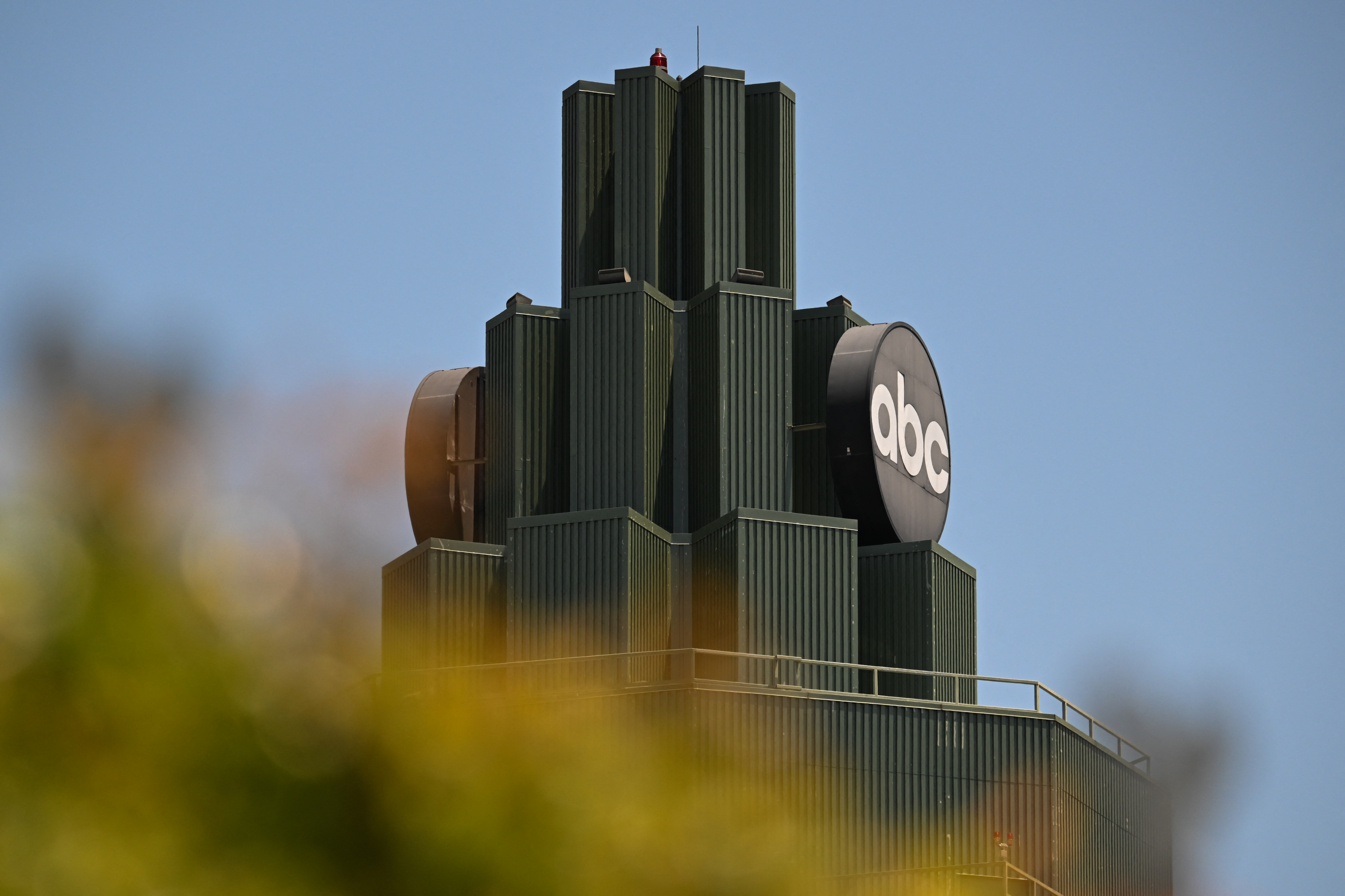 (FILES) The ABC Television logo is displayed outside a building at The Walt Disney Studios in Burbank, California on June 2, 2025.
