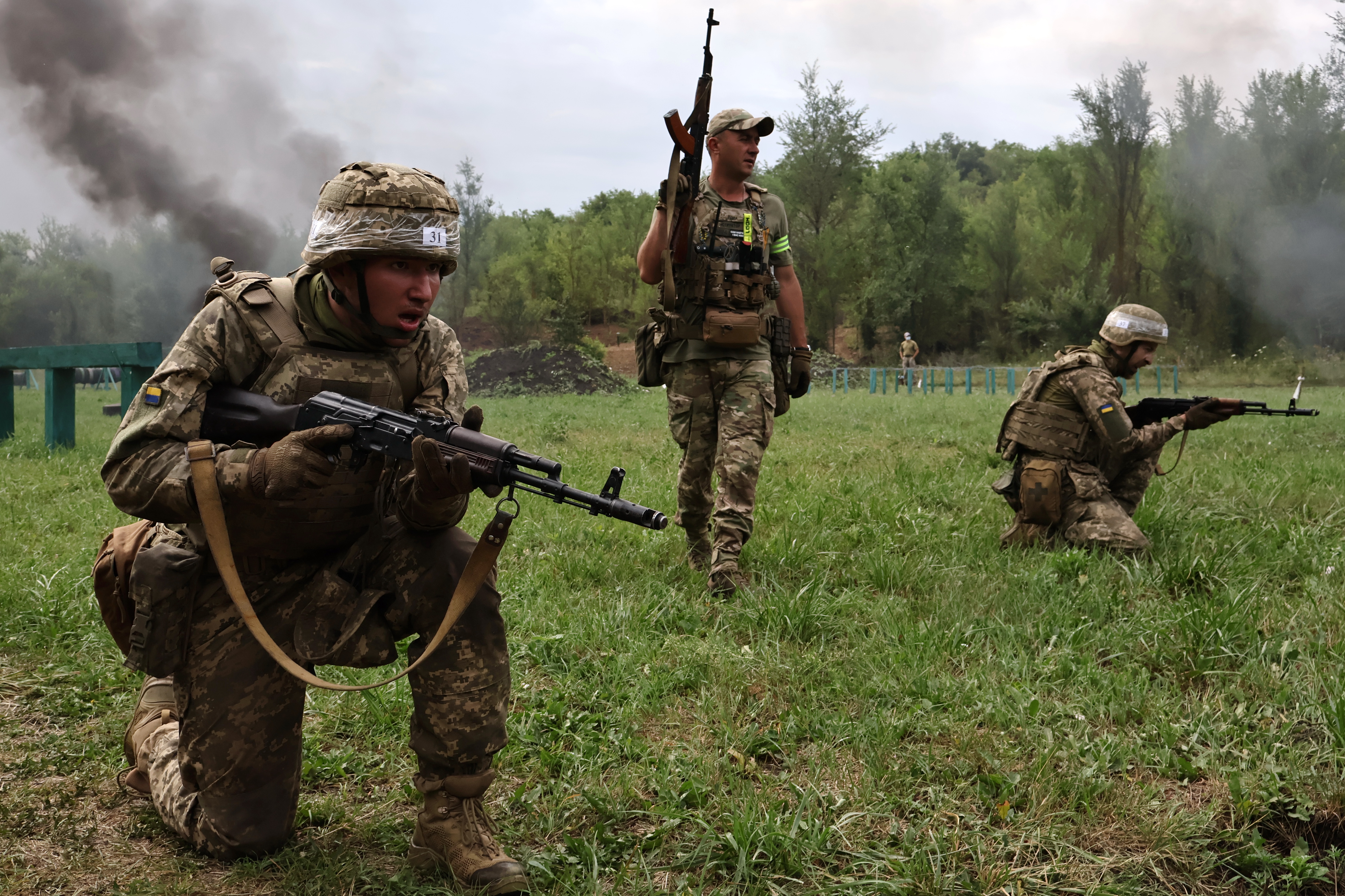 Soldiers practise military skills at a training ground near the front line in the Zaporizhia region, Ukraine