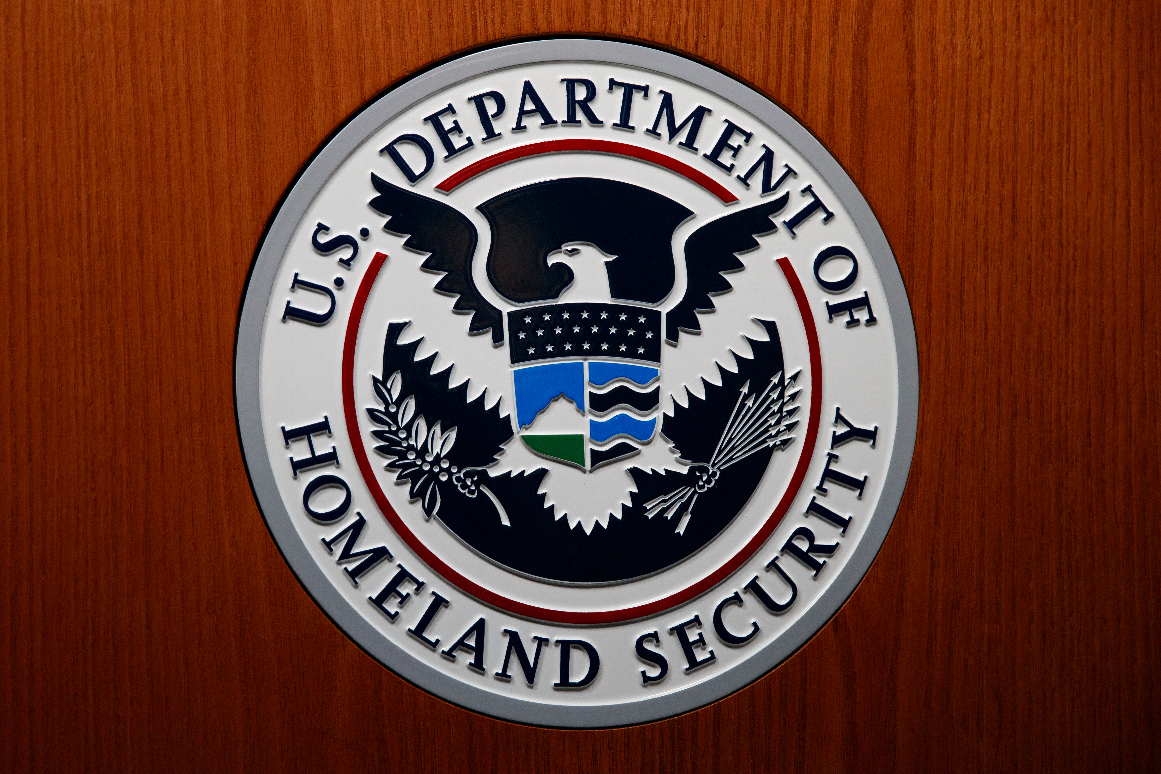 FILE - The Department of Homeland Security (DHS) seal during a news conference June 28, 2019, in Washington. (AP Photo/Carolyn Kaster, File)