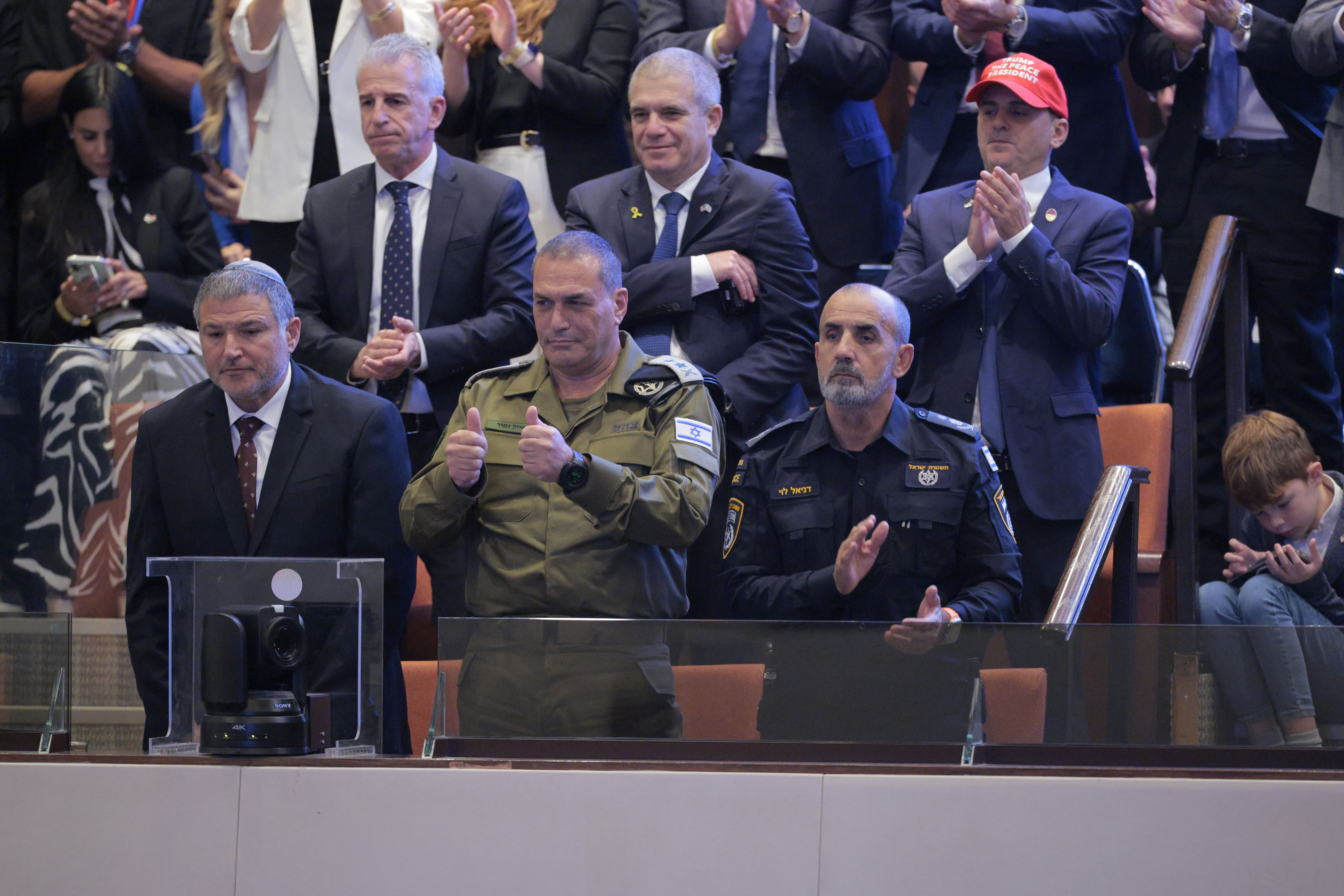 JERUSALEM - OCTOBER 13: Israel's army chief Lieutenant General Eyal Zamir gives thumbs up at the Knesset, Israel’s parliament, on October 13, 2025 in Jerusalem. President Trump is visiting the country hours after Hamas released some of the remaining Israeli hostages captured on Oct. 7, 2023, part of a US-brokered ceasefire deal to end the war in the Gaza Strip. (Photo by Chip Somodevilla/Getty Images)