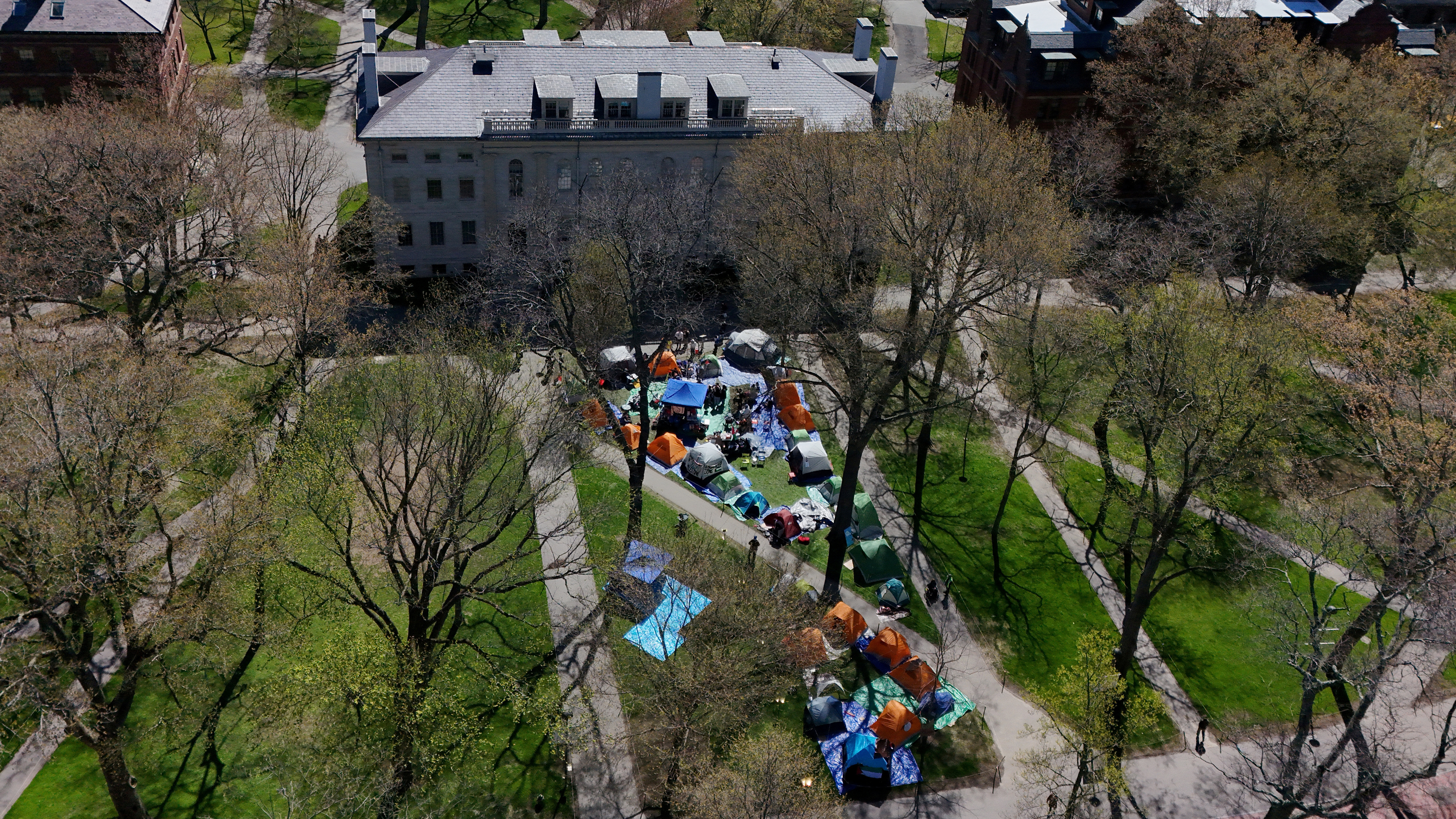 FILE PHOTO: A drone view shows an encampment at Harvard University where students protest in support of Palestinians, during the ongoing conflict between Israel and the Palestinian Islamist group Hamas, in Cambridge, Massachusetts, U.S., April 25, 2024. REUTERS/Brian Snyder/File Photo