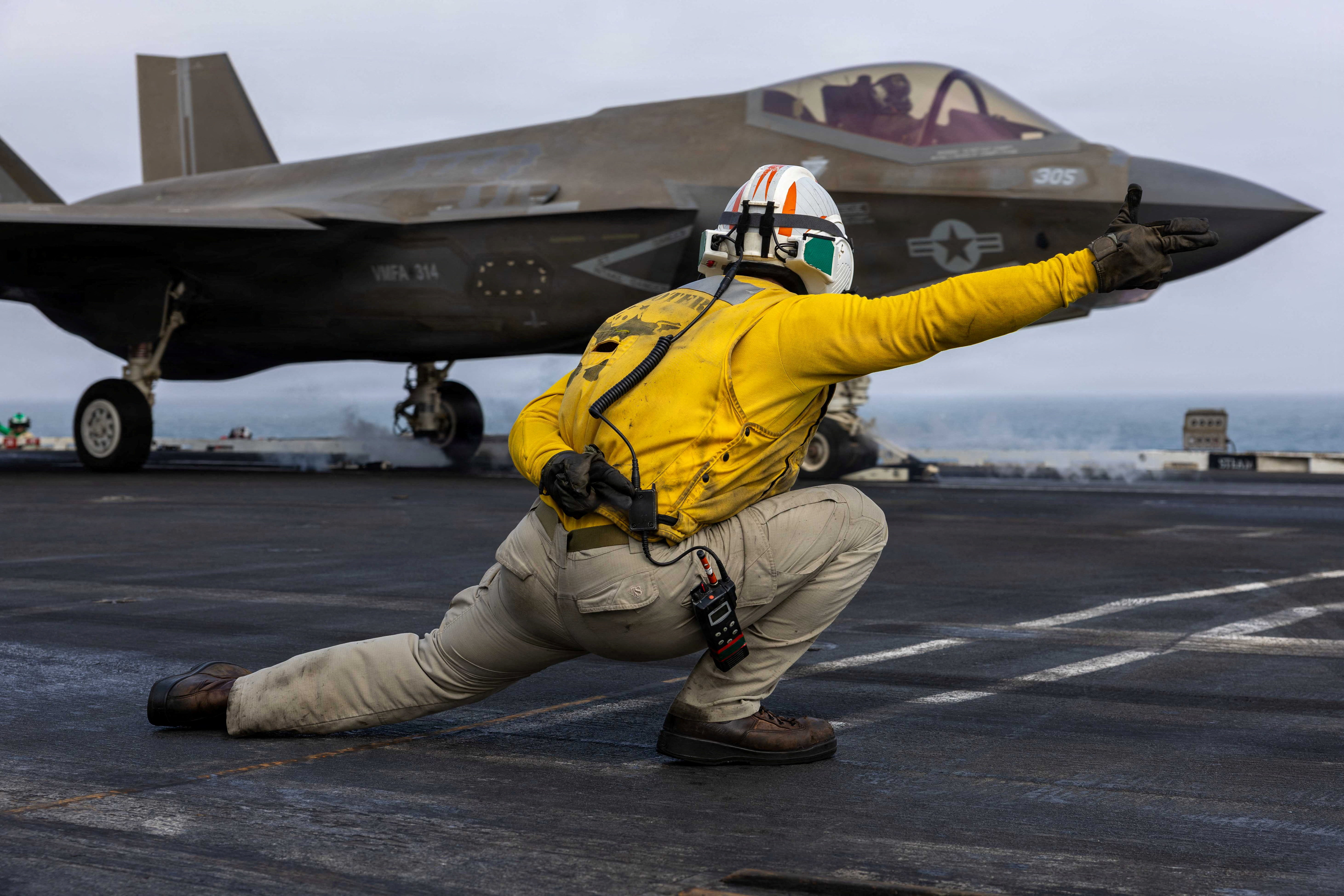 A U.S. sailor launches an F-35C Lightning II, assigned to Marine Fighter Attack Squadron 314, from the flight deck of Nimitz-class aircraft carrier USS Abraham Lincoln during the ongoing conflict with Iran August 5, 2026. U.S. Navy/Handout via REUTERS THIS IMAGE HAS BEEN SUPPLIED BY A THIRD PARTY.