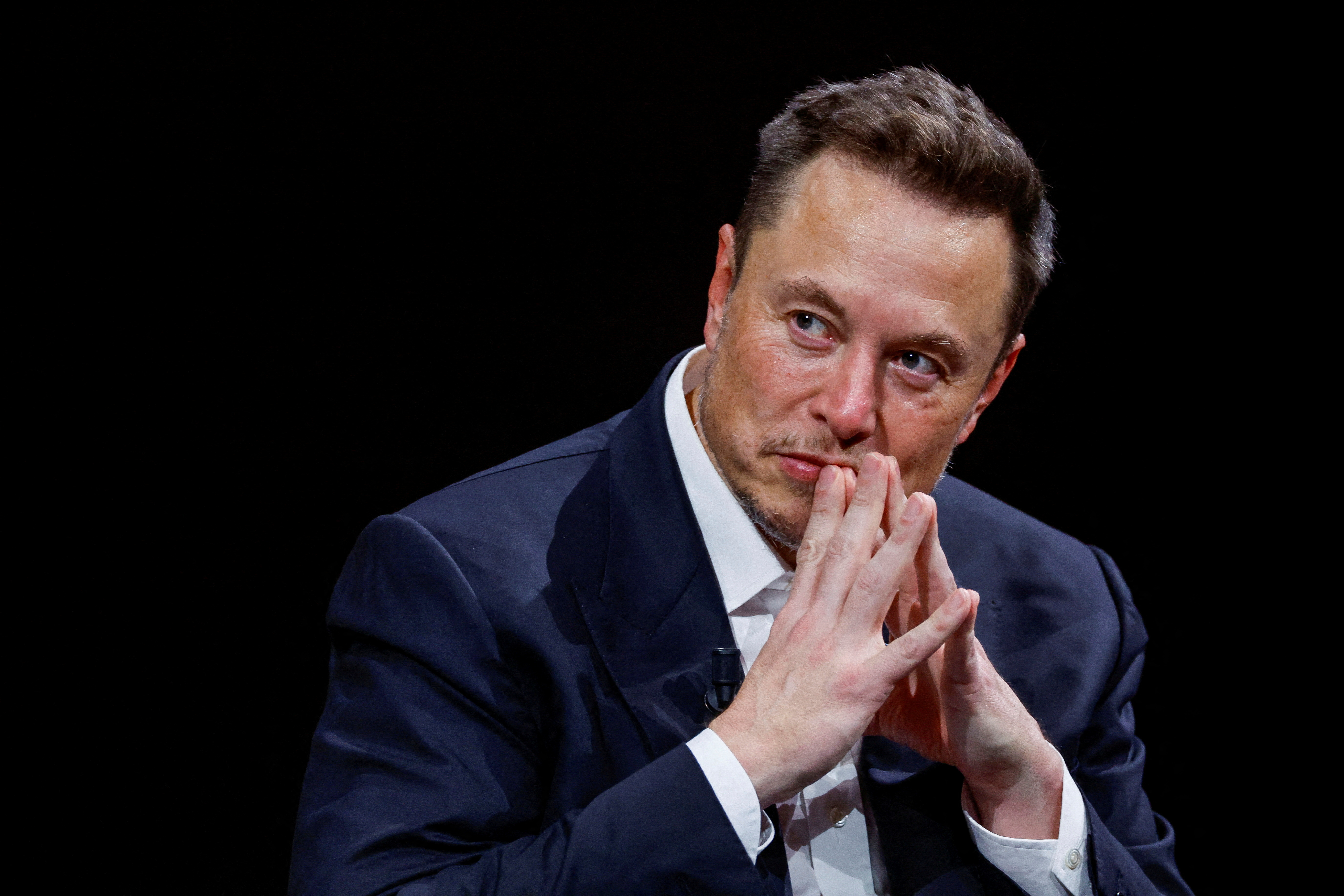 FILE PHOTO: Elon Musk, CEO of Tesla and SpaceX, gestures as he attends the Viva Technology conference dedicated to innovation and startups at the Porte de Versailles exhibition centre in Paris, France, June 16, 2023. REUTERS/Gonzalo Fuentes/File Photo