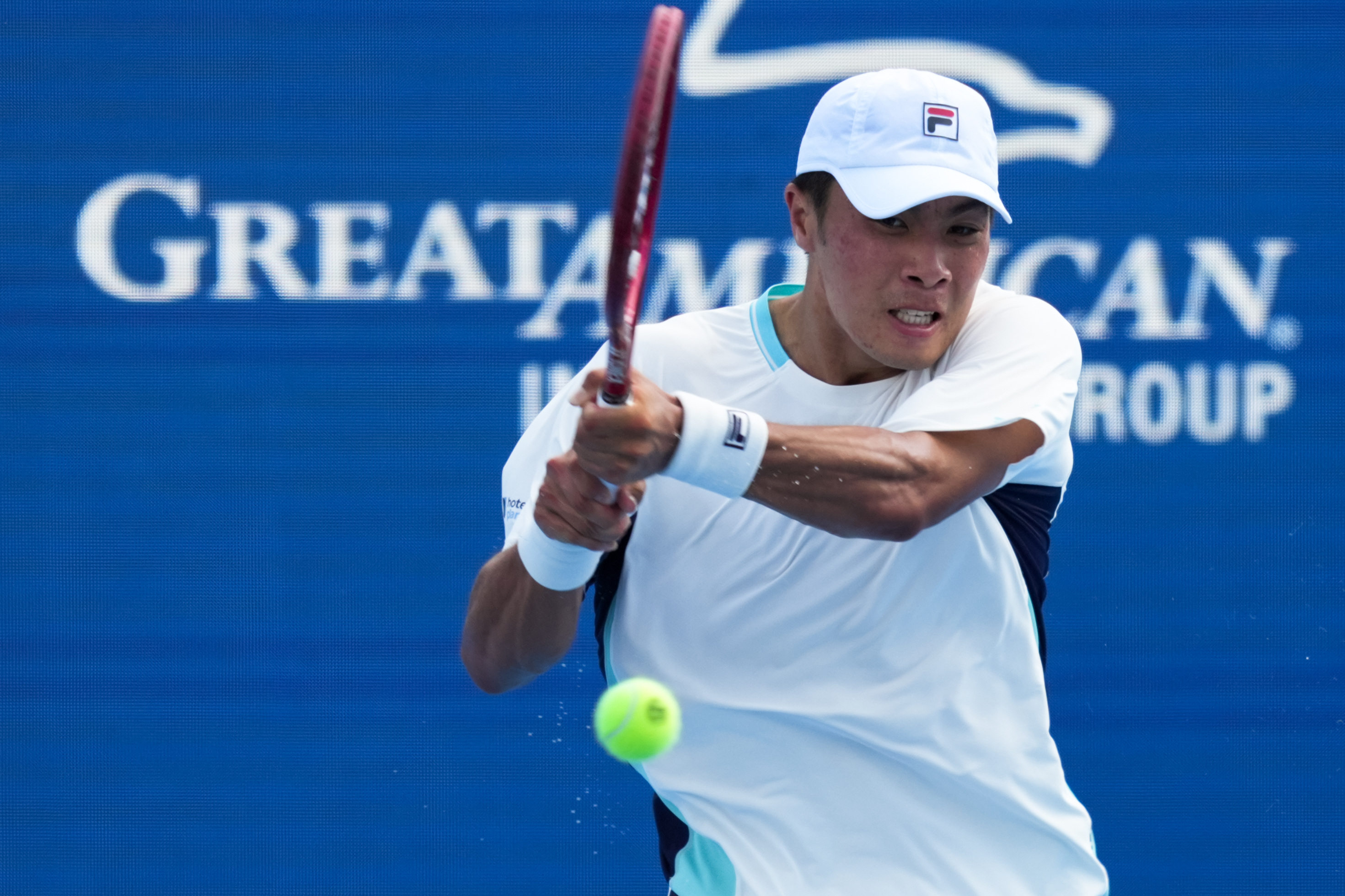 Aug 18, 2026; Mason, OH, USA; Brandon Nakashima (USA) returns a shot against Daniil Medvedev during the Cincinnati Open at Lindner Family Tennis Center. Mandatory Credit: Aaron Doster-Imagn Images
