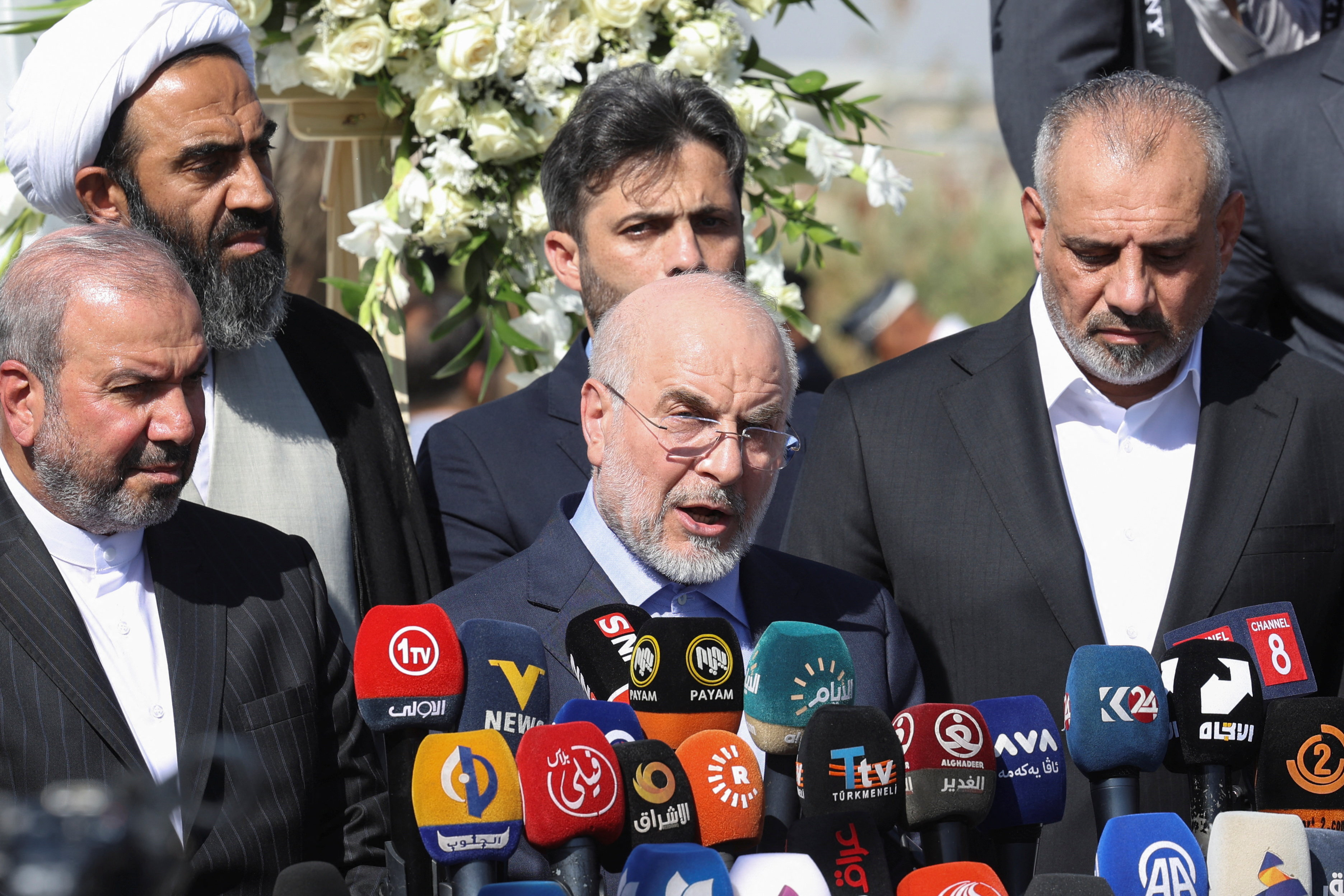 Iranian Parliament Speaker Mohammad Baqer Qalibaf delivers a speech at the site where Iranian military commander Qassem Soleimani and Iraqi paramilitary commander Abu Mahdi al-Muhandis were killed in a U.S. drone strike, near Baghdad International Airport, Iraq, August 19, 2026. REUTERS/Ahmed Saad