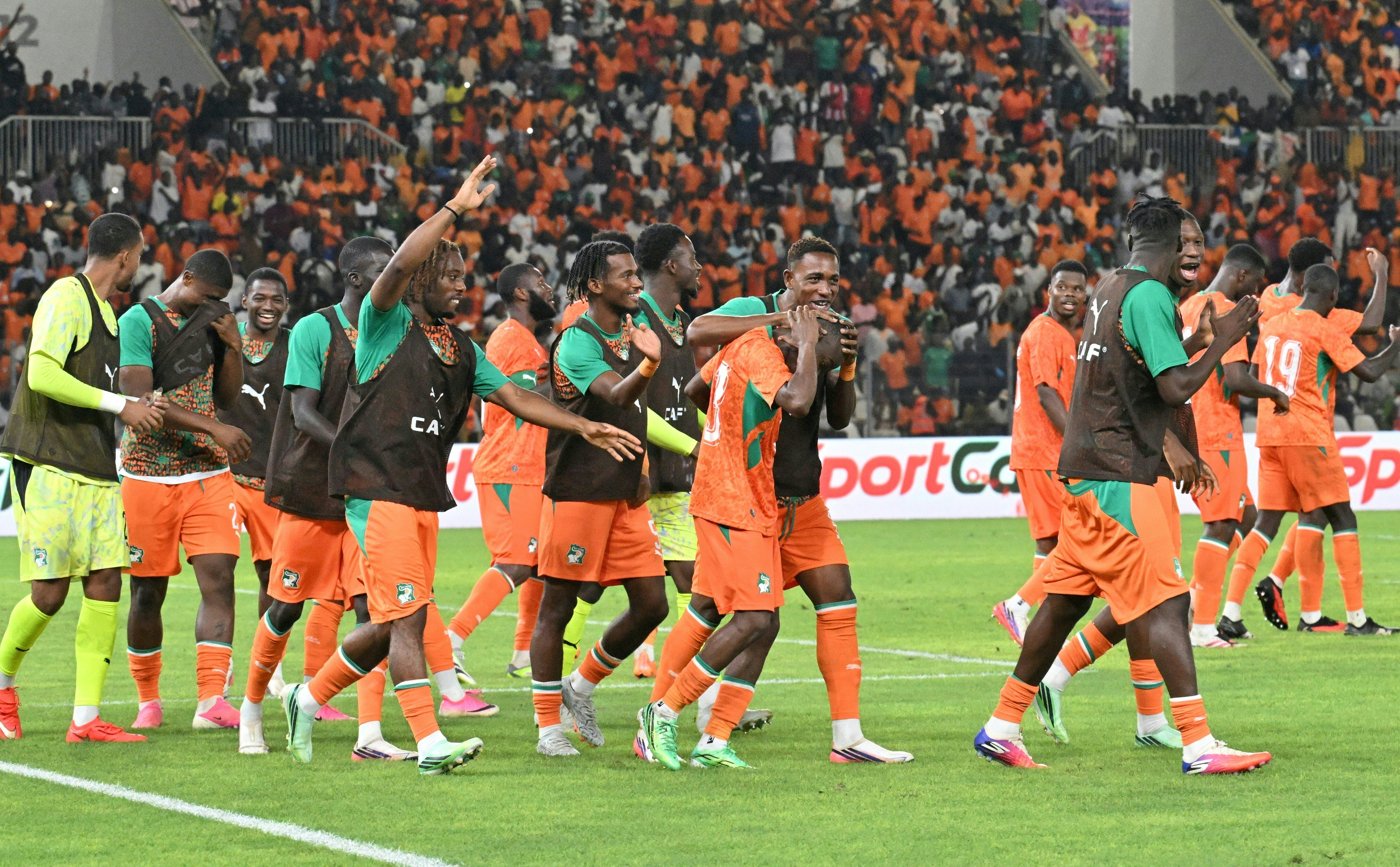 Ivory Coast team players celebrate after a goal during the Africa Cup of Nations 2027 qualifying football match between Ivory Coast and Ghana