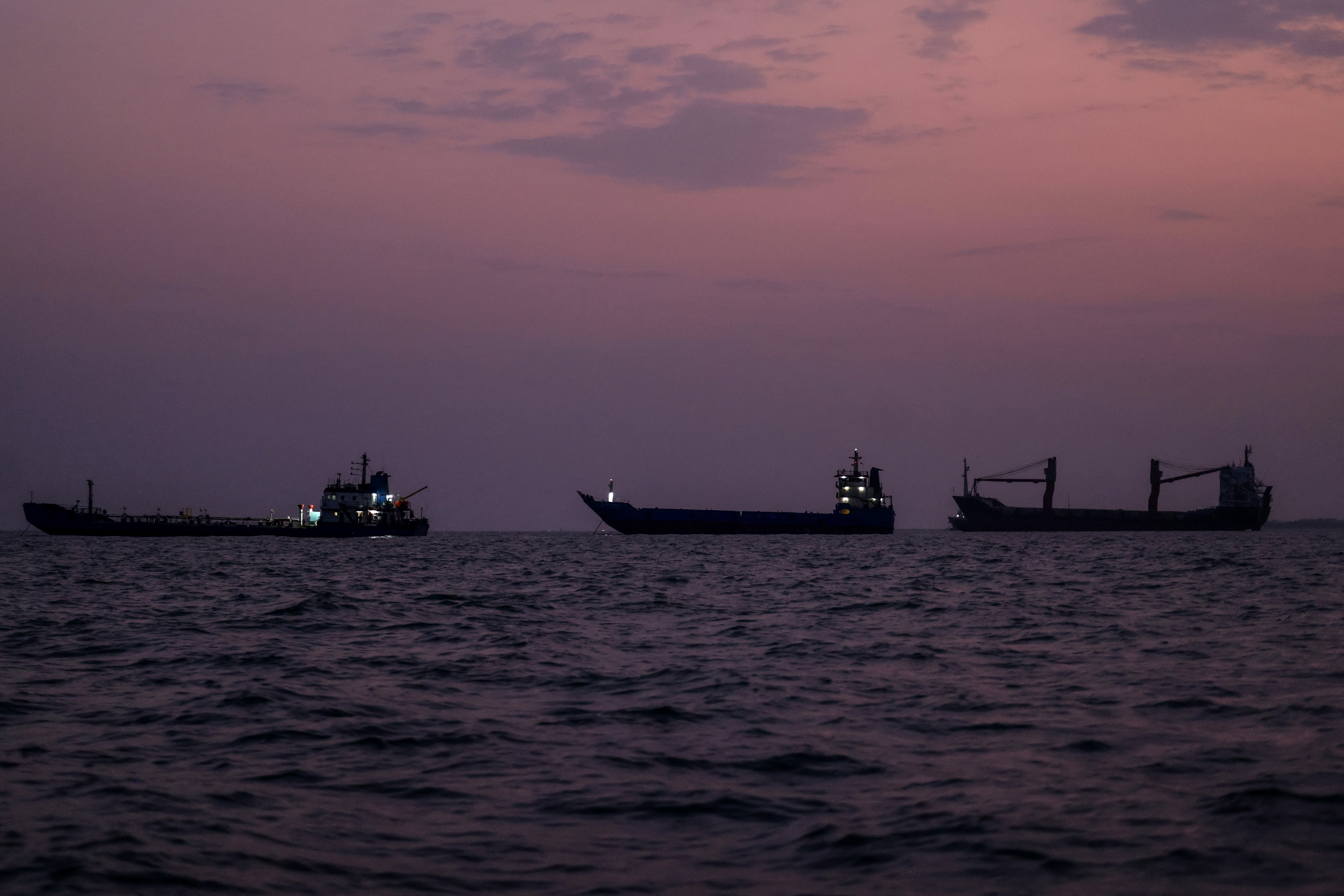 Vessels transit the Strait of Hormuz off the coast of the port city of Bandar Abbas in southern Iran on September 5, 2026. The United States said it struck and destroyed three Iranian oil tankers on September 5 in response to attempted missile attacks on naval vessels, in the latest exchange of fire since renewed hostilities flared between the foes. The new clashes, which began with US raids last week, come with both sides deadlocked in the six-month war as Iran keeps a stranglehold on the Strait of Hormuz and Washington presses its counter-blockade of Iranian ports. (Photo by Atta KENARE / AFP) /