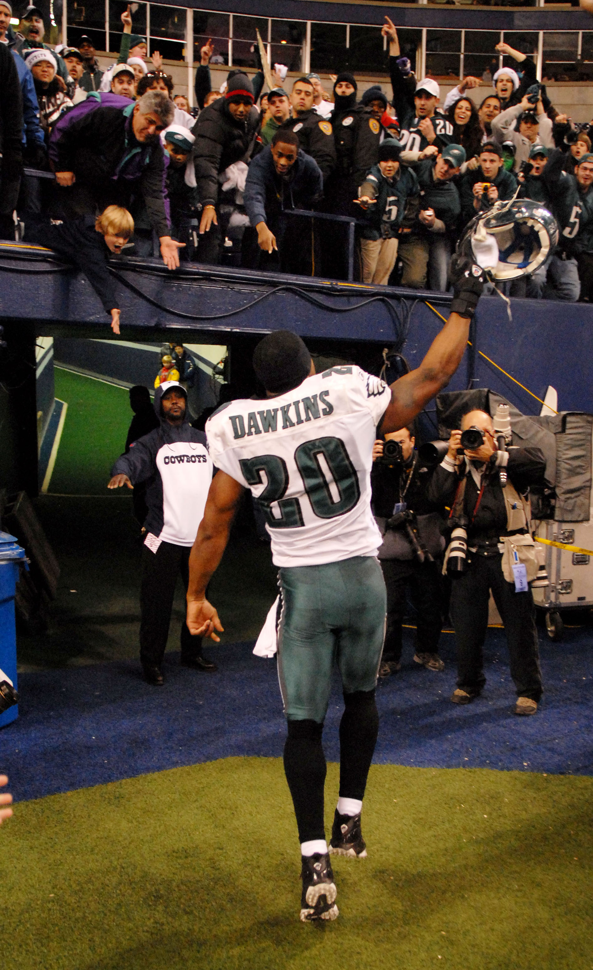 Dec. 25, 2006; Irving, TX, USA; Philadelphia Eagles safety (20) Brian Dawkins celebrates as he runs off the field after defeating the Dallas Cowboys at Texas Stadium in Irving, Texas. Philadelphia defeated Dallas 23-7. Mandatory Credit: Mark J. Rebilas-USA TODAY Sports © 2006 Mark J. Rebilas