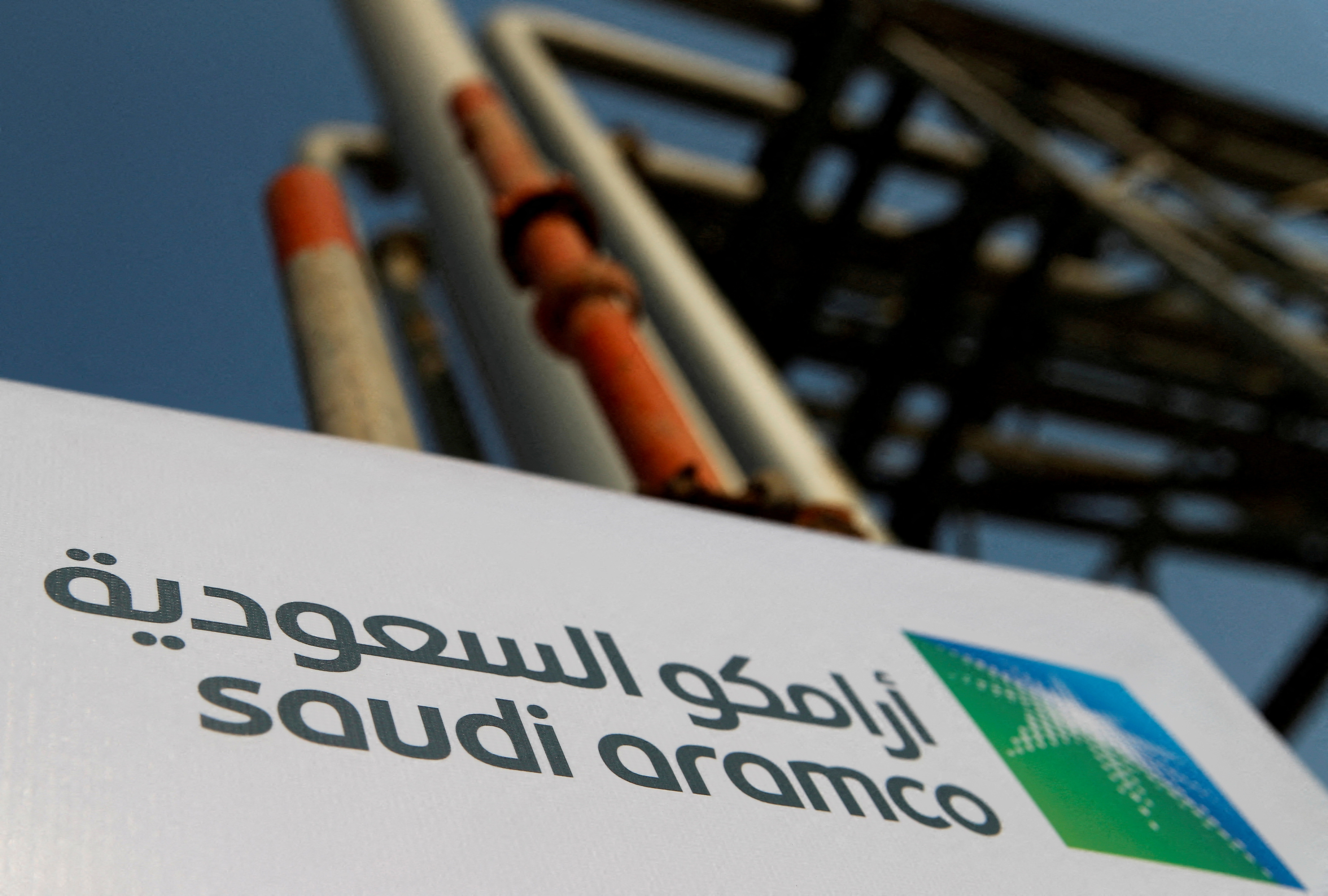 FILE PHOTO: The Saudi Aramco logo is seen at an oil facility in Abqaiq, Saudi Arabia, October 12, 2019. REUTERS/Maxim Shemetov/File Photo