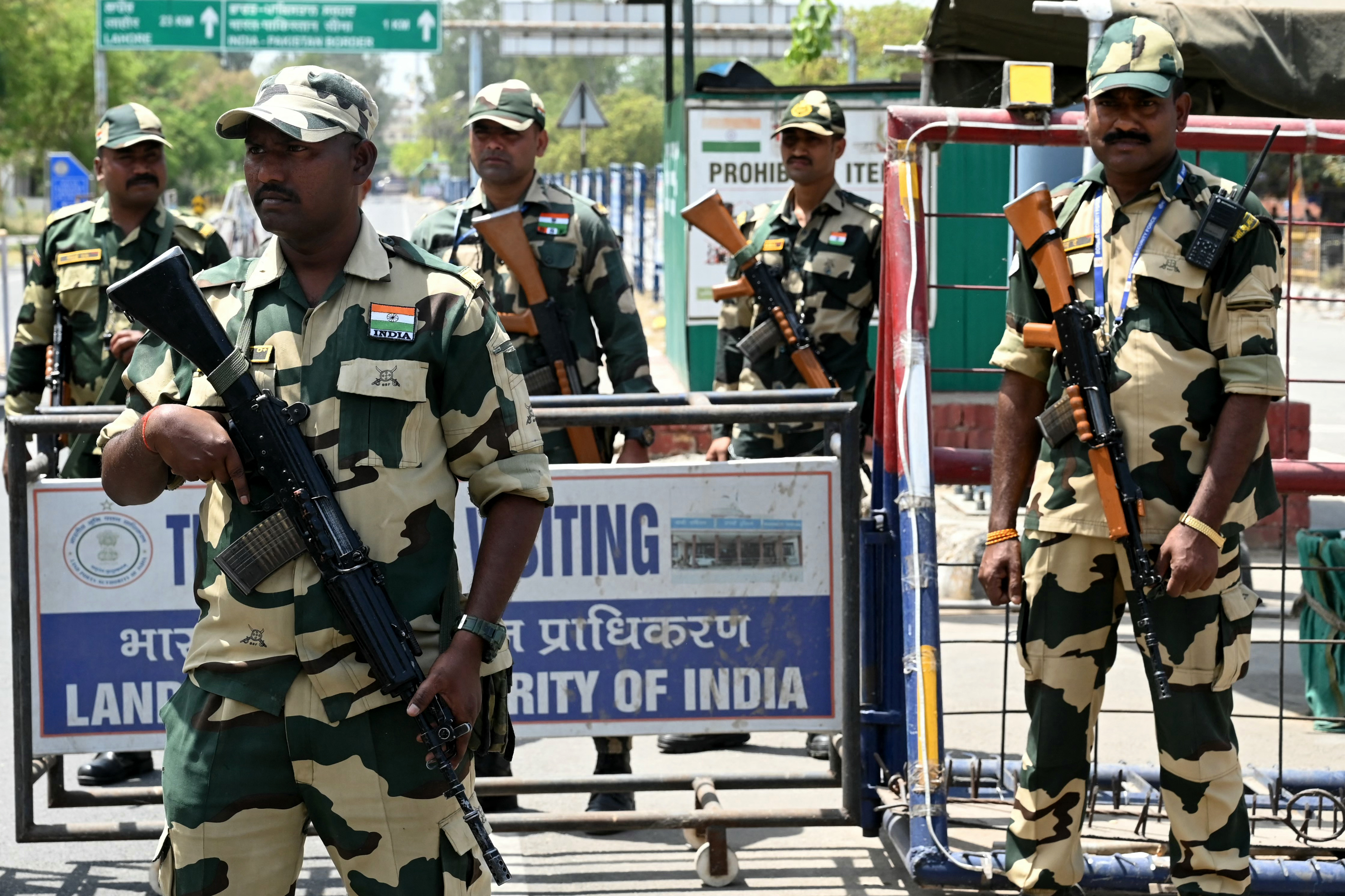Indian Border Security Force (BSF) soldiers stand guard at the India-Pakistan Wagah border post on the outskirts of Amritsar on April 24, 2025. At least 26 people were killed April 22 in Indian-administered Kashmir when gunmen opened fire on tourists, security sources told AFP, in the insurgency-hit region's deadliest attack on civilians since 2000. (Photo by Narinder NANU / AFP)