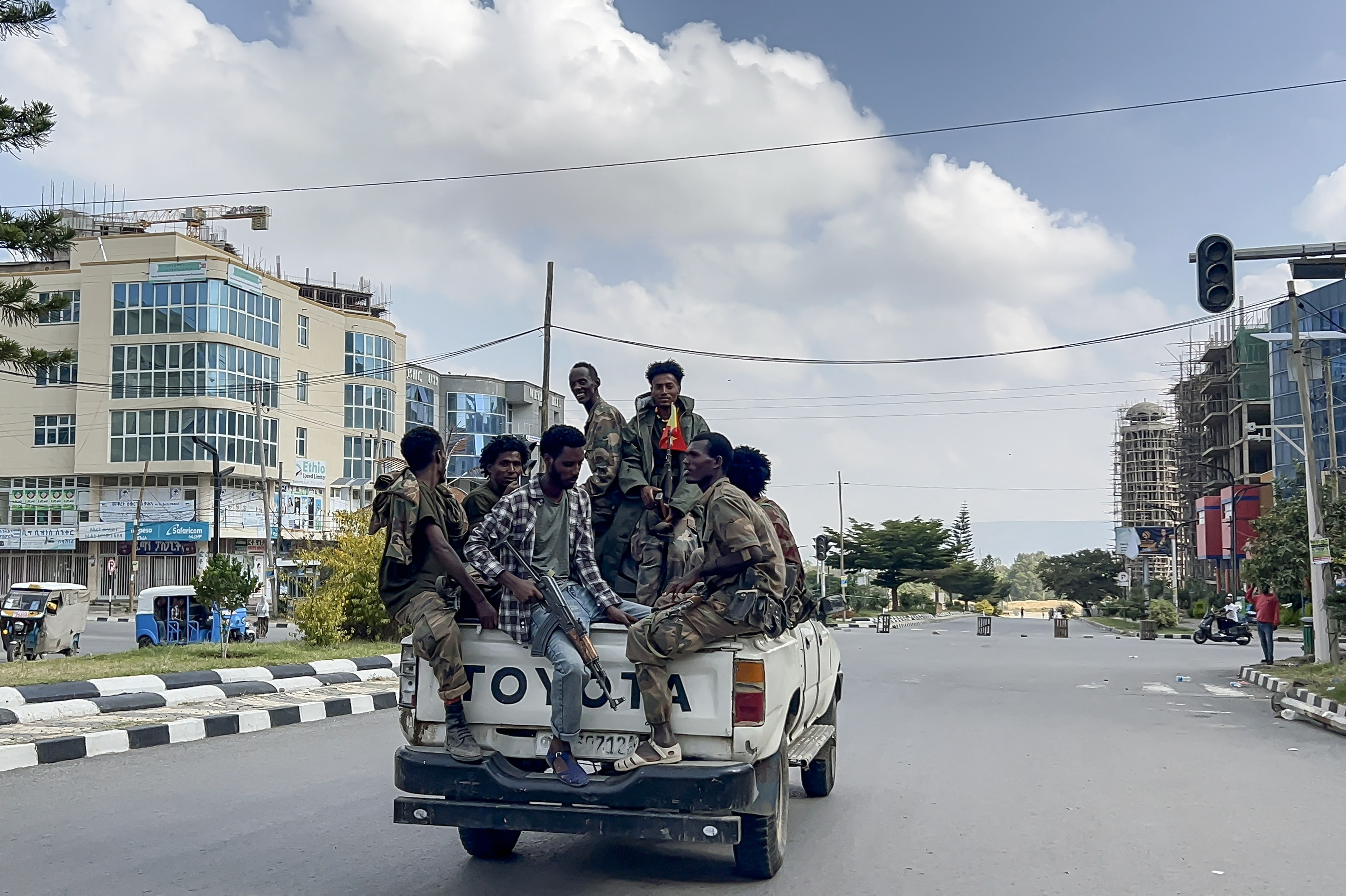 Members of the pro-government Tigray Peace Force ride in a pickup truck as they patrol Mekelle, Ethiopia, on October 4, 2026, a day after federal and allied forces entered the regional capital [File: AFP]