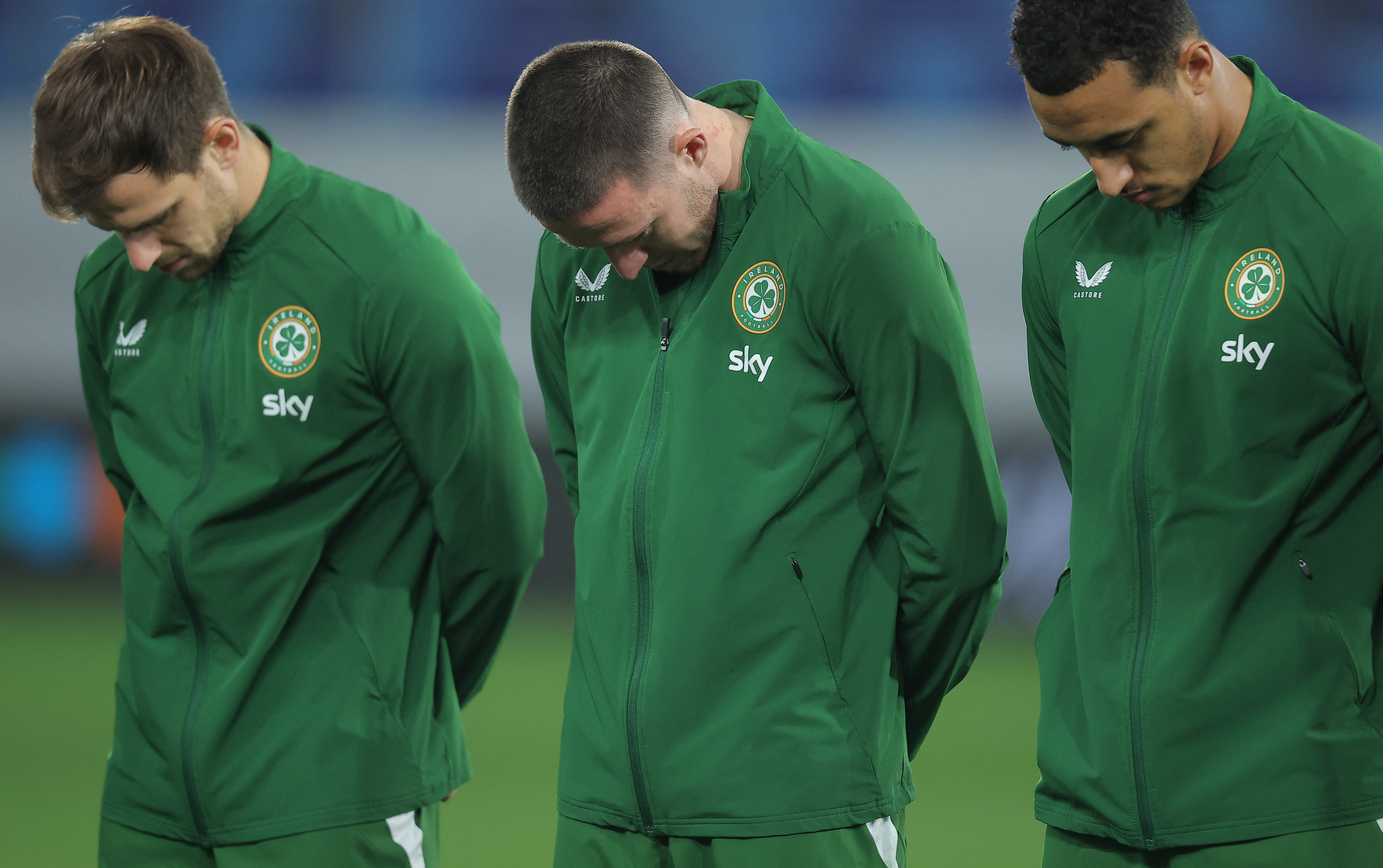Republic of Ireland's midfielder #06 Jayson Molumby (L), Republic of Ireland's midfielder #17 Jack Moylan (C) and Republic of Ireland's forward #10 Adam Idah (R) bow their heads during the national anthem of Israel ahead of the UEFA Nations League Group B3 football match between the Republic of Ireland and Israel at the TSC Arena in Backa Topola on October 4, 2026. (Photo by Pedja Milosavljevic / AFP)