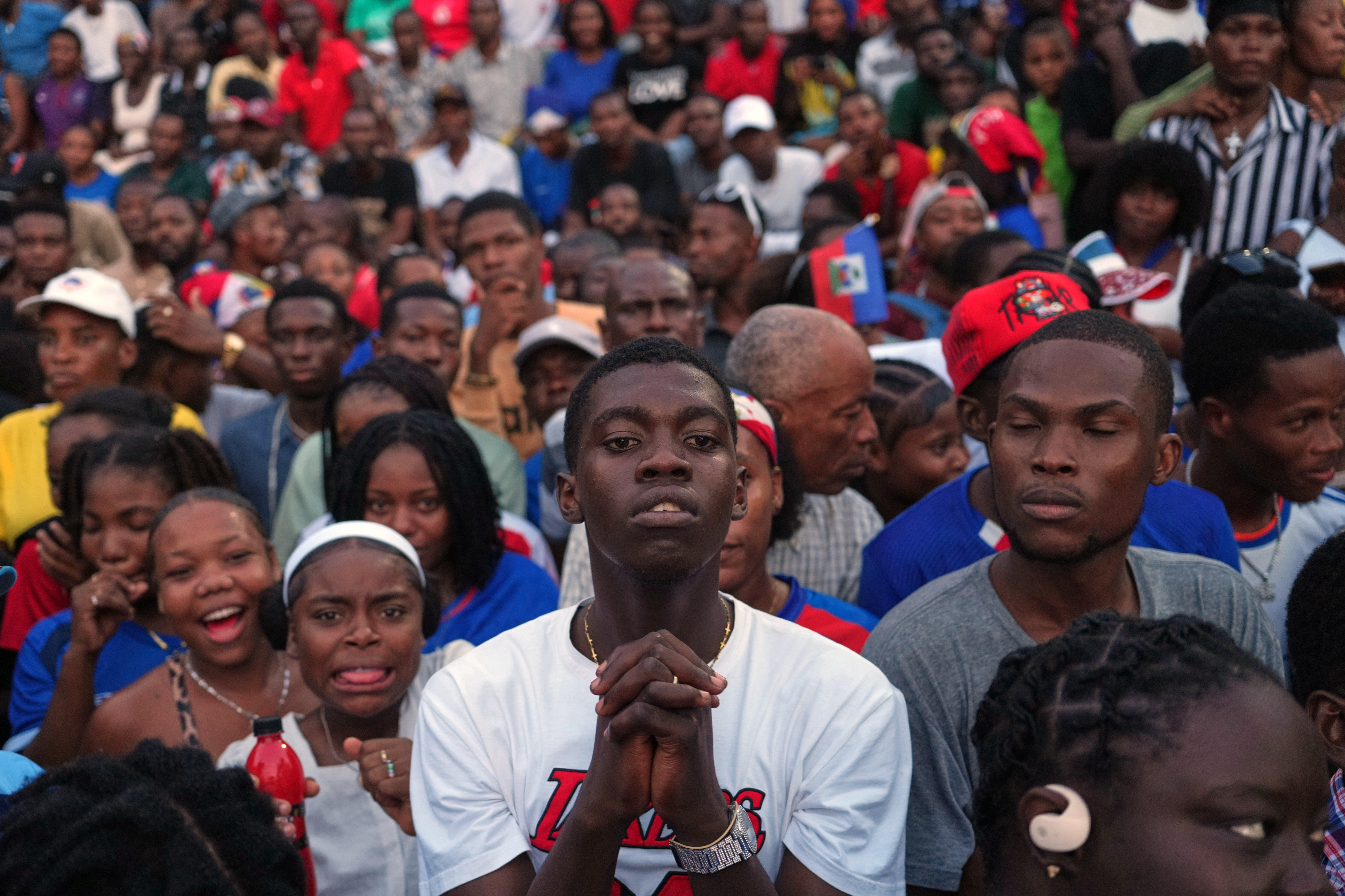 FILE - Soccer fans attend a World Cup watch party for the match between Morocco and Haiti, in Port-au-Prince, June 24, 2026. (AP Photo/Odelyn Joseph, File)