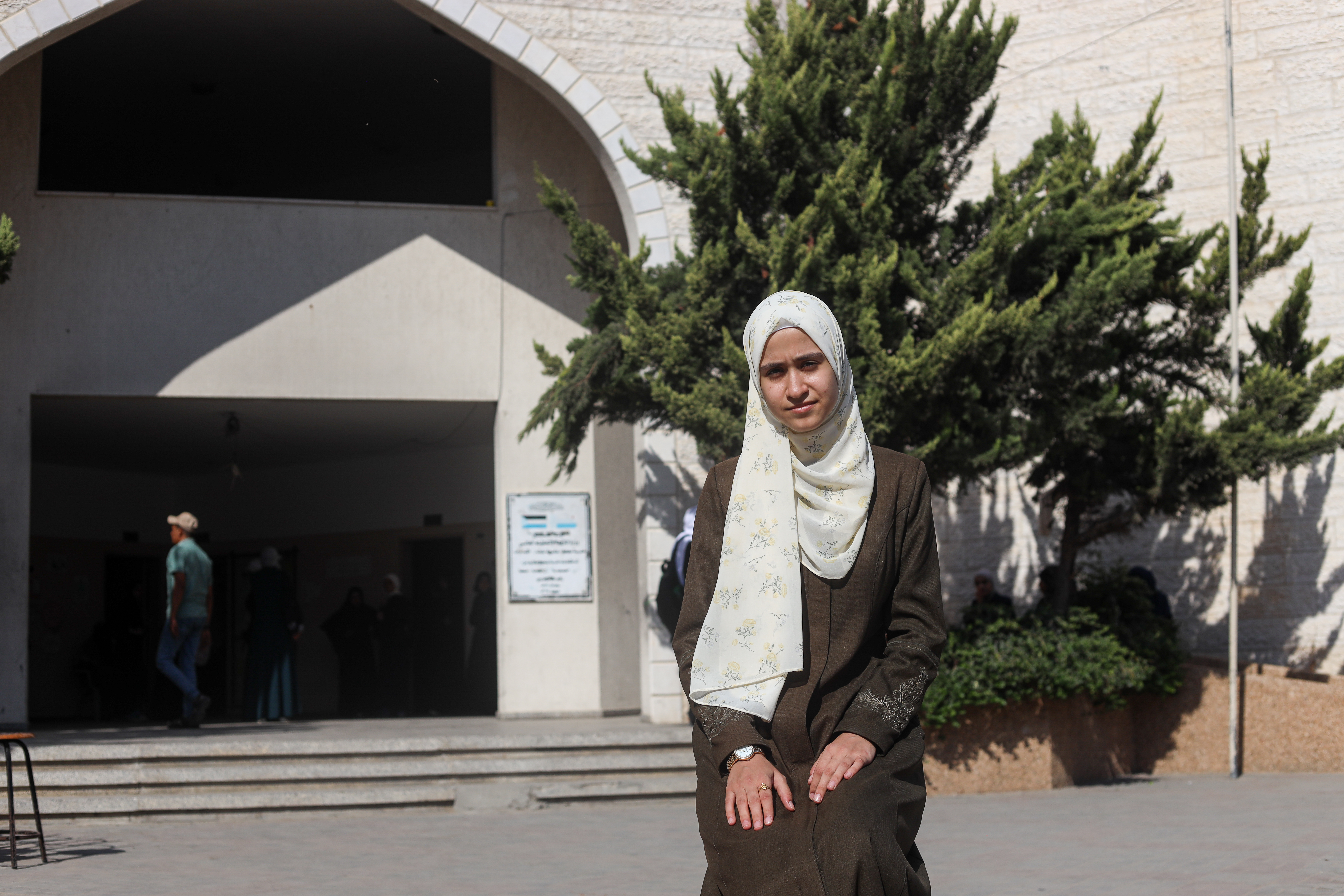 Lina Yunis Abd al-Qader was once known as "the tall Lina" to distinguish her from another classmate with the same name