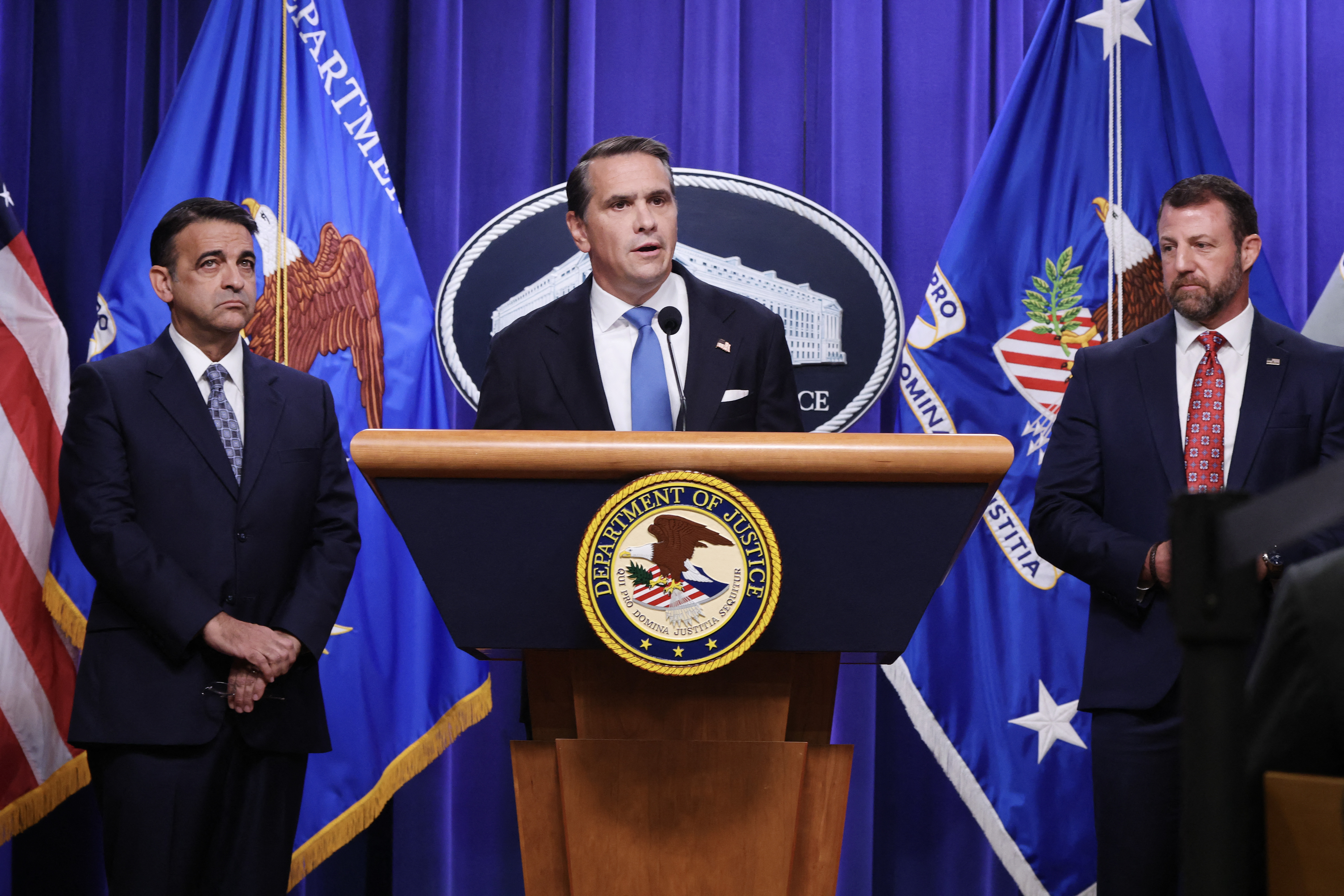WASHINGTON, DC - SEPTEMBER 30: (L-R) U.S. Attorney Daniel Rosen for the District of Minnesota, U.S. Attorney General Todd Blanche and U.S. Secretary of Homeland Security Markwayne Mullin speak during a news conference at the Robert F. Kennedy Department of Justice building on September 30, 2026 in Washington, DC. The DOJ held the news conference to announce they had arrested 10 people for allegedly voting illegally in elections in Minnesota. Anna Moneymaker/Getty Images/AFP (Photo by Anna Moneymaker / GETTY IMAGES NORTH AMERICA / Getty Images via AFP)
