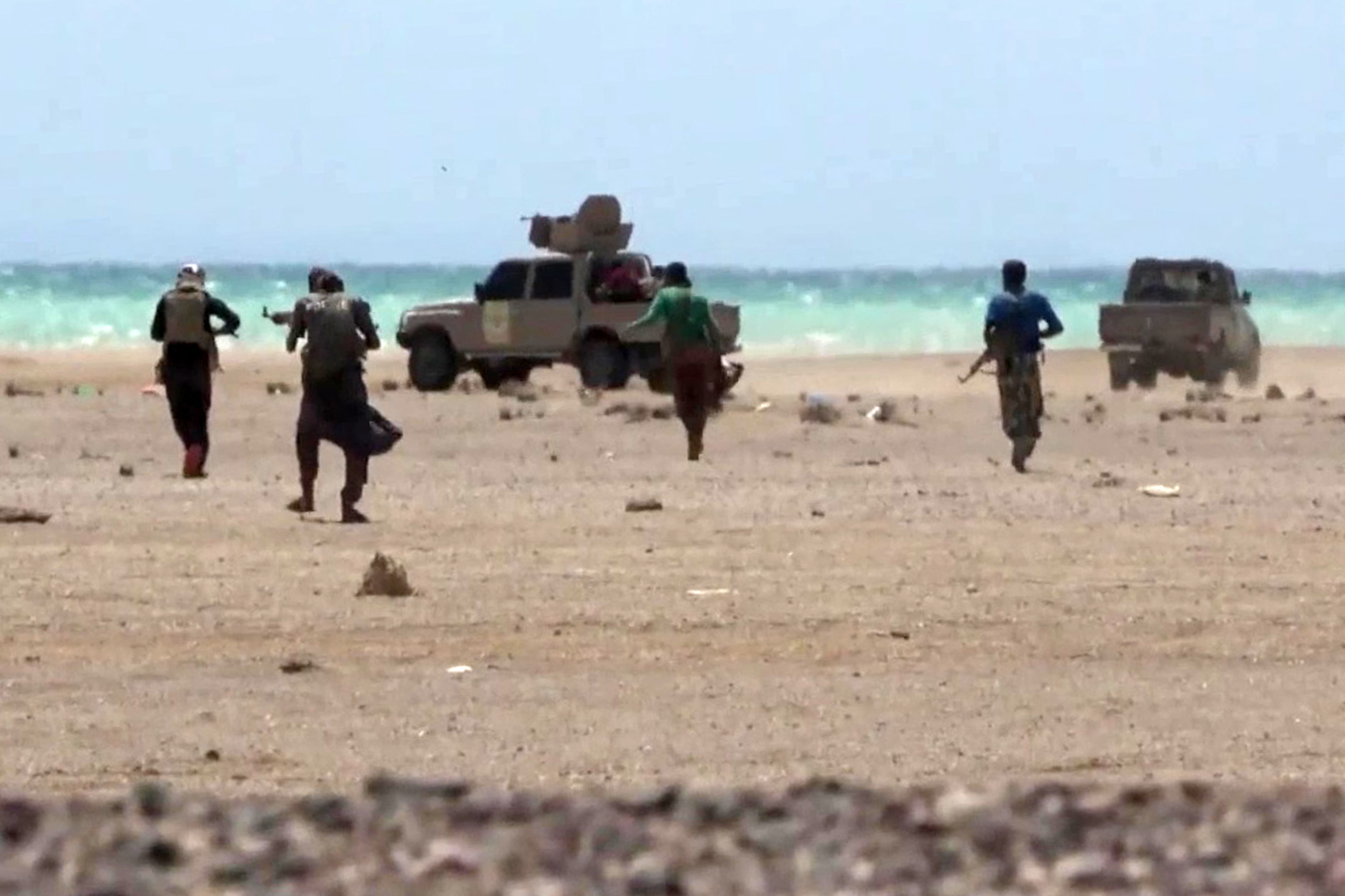 This screen grab taken from video footage released by the pro-Yemeni government Southern Giants Brigades on October 6, 2026 reportedly shows fighters near the Red Sea shore in the Dhobab district in Taiz province.