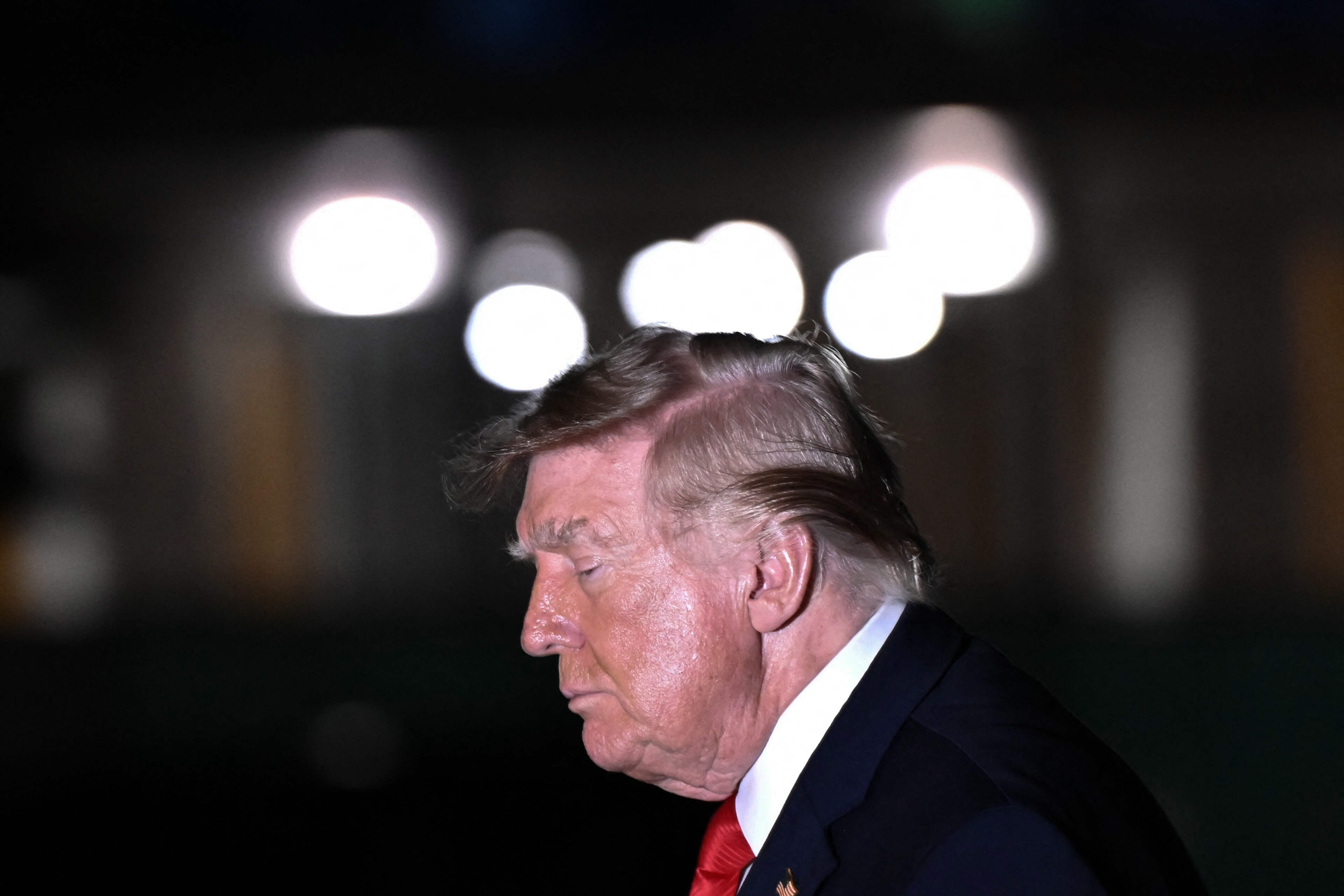 US President Donald Trump walks to the White House after arriving in Washington, DC, on October 12, 2026.