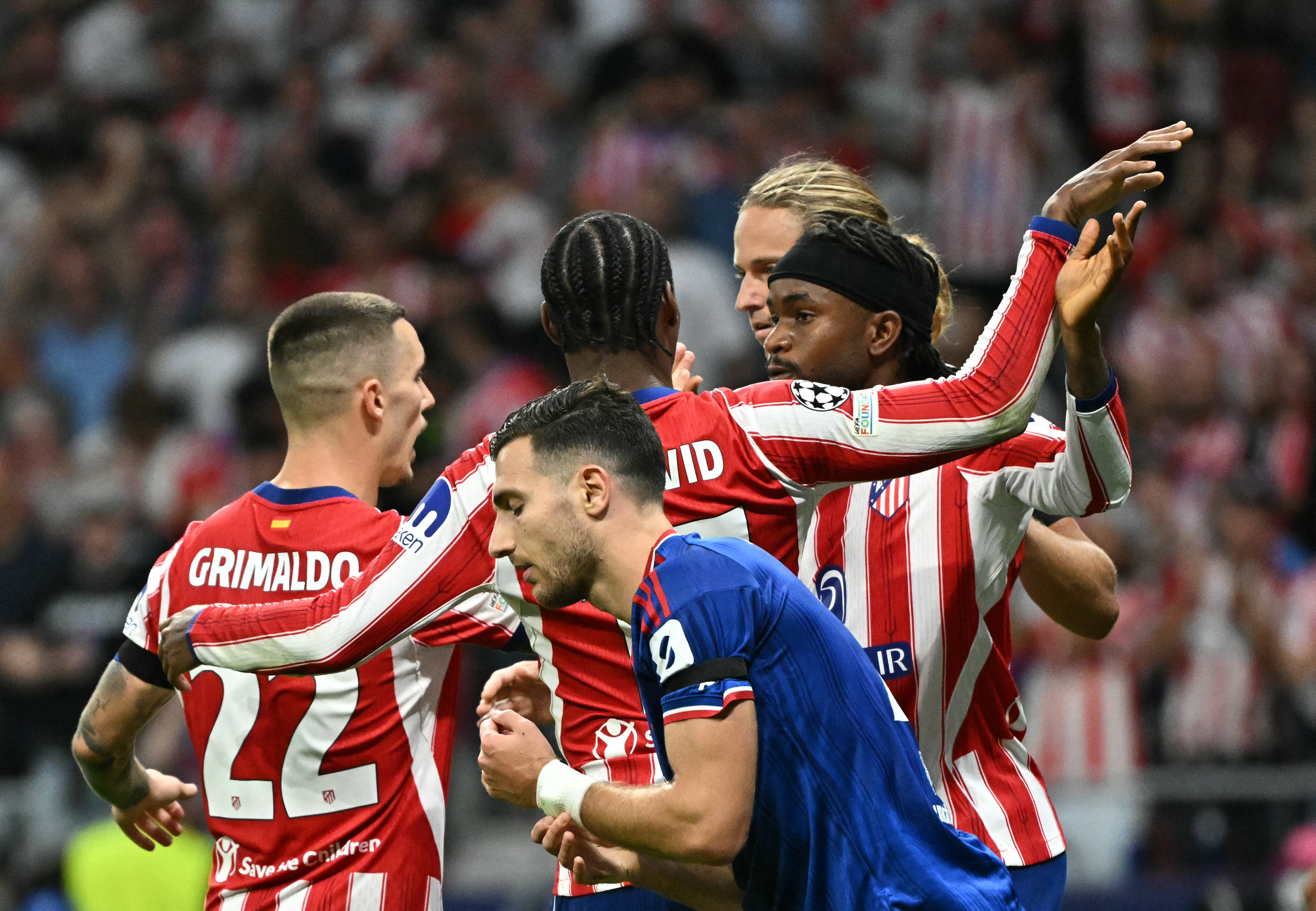 Atletico Madrid's Nigerian forward #11 Ademola Lookman celebrates scoring his team's second goal during the UEFA Champions League, league phase, matchday 2, football match between Club Atletico de Madrid and Manchester United at the Metropolitano stadium in Madrid on October 13, 2026.