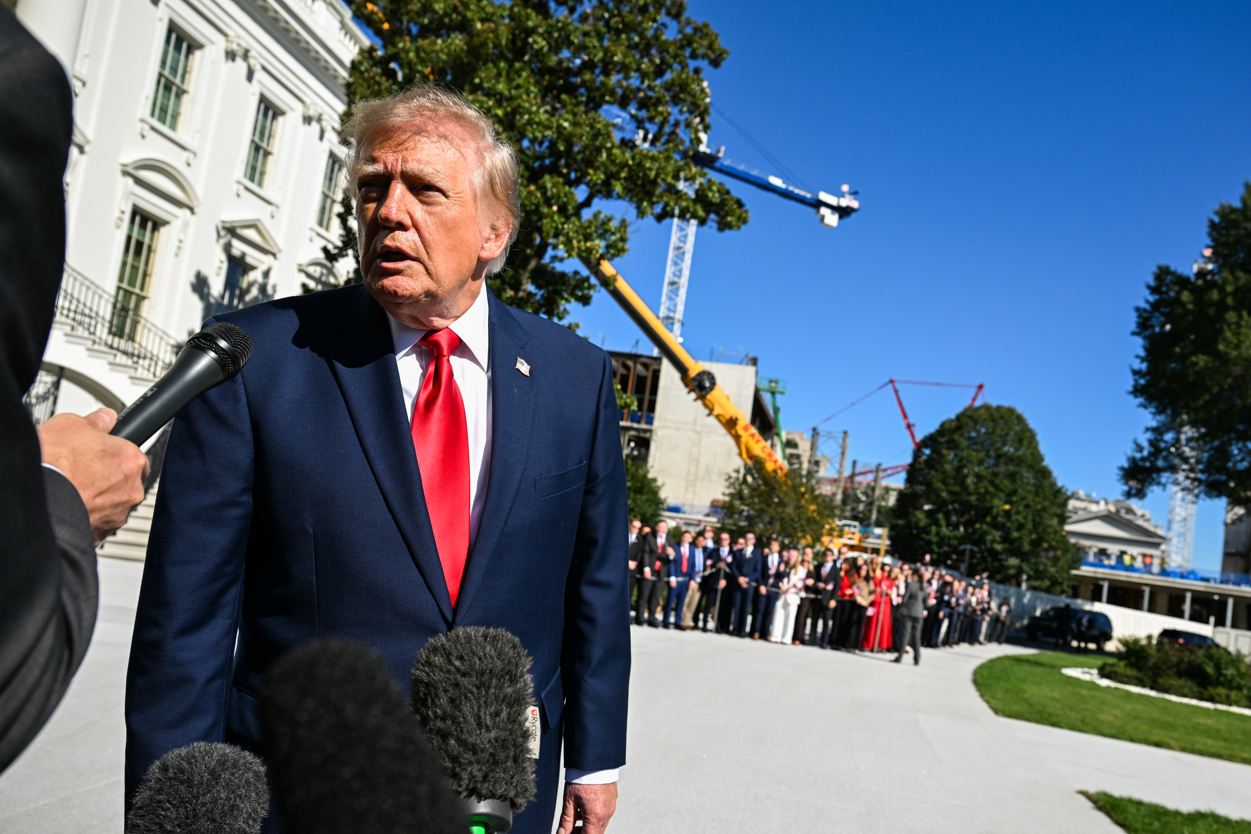 epa13288154 US President Donald Trump speaks to the press as he departs the White House in Washington, DC, USA, 07 October 2026. EPA/ANNABELLE GORDON / POOL