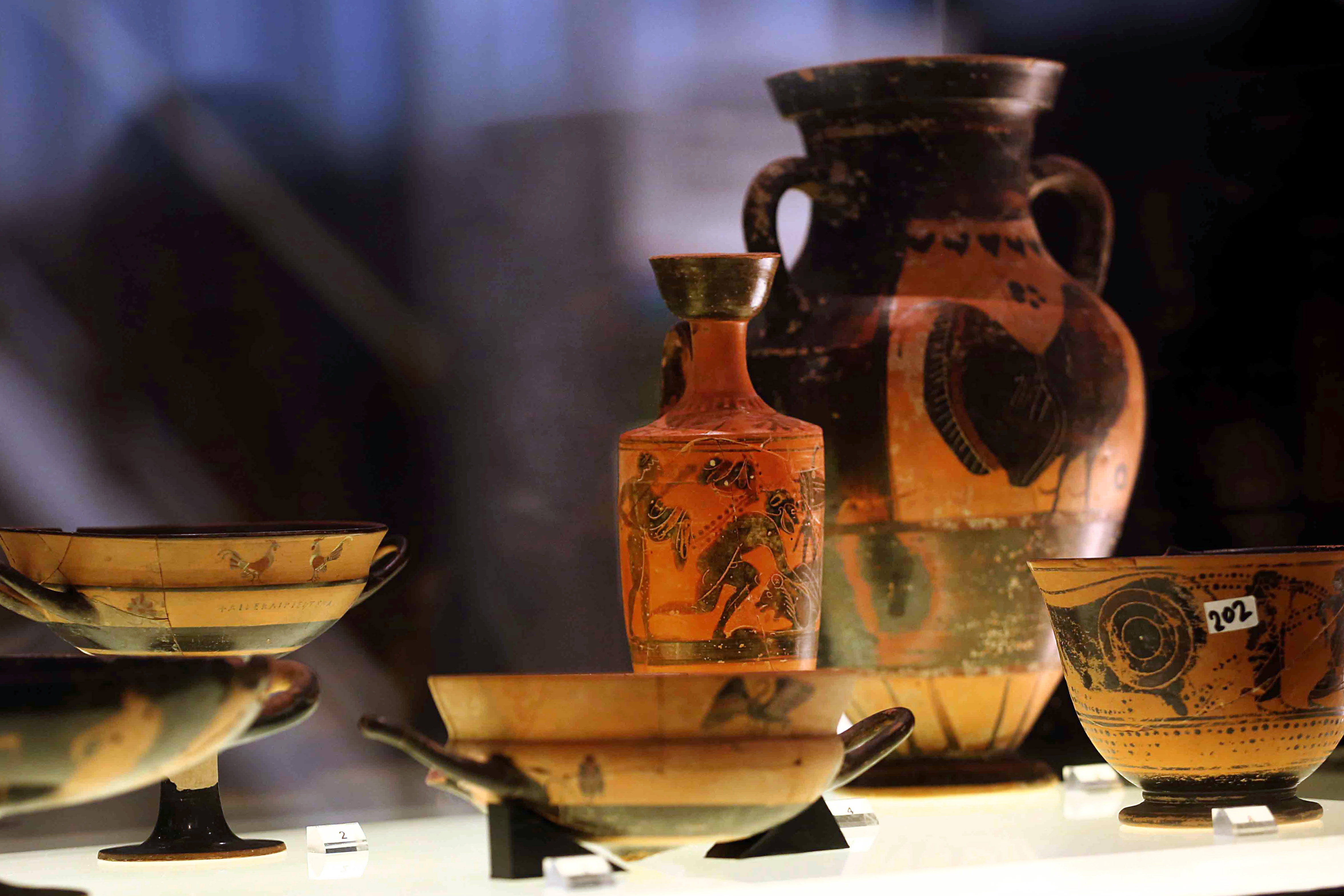 epa13300223 Returned ancient Greek antiquities are displayed inside the Altar Hall at the National Archaeological Museum following an official handing-over ceremony in Athens, Greece, 13 October 2026. Attended by Greek Minister of Culture Lina Mendoni and Israeli Ambassador to Greece Pninat Yanay, the event marked the formal return of artifacts seized by Israeli authorities during an investigation into illicit antiquities trafficking. EPA/ALEXANDROS BELTES