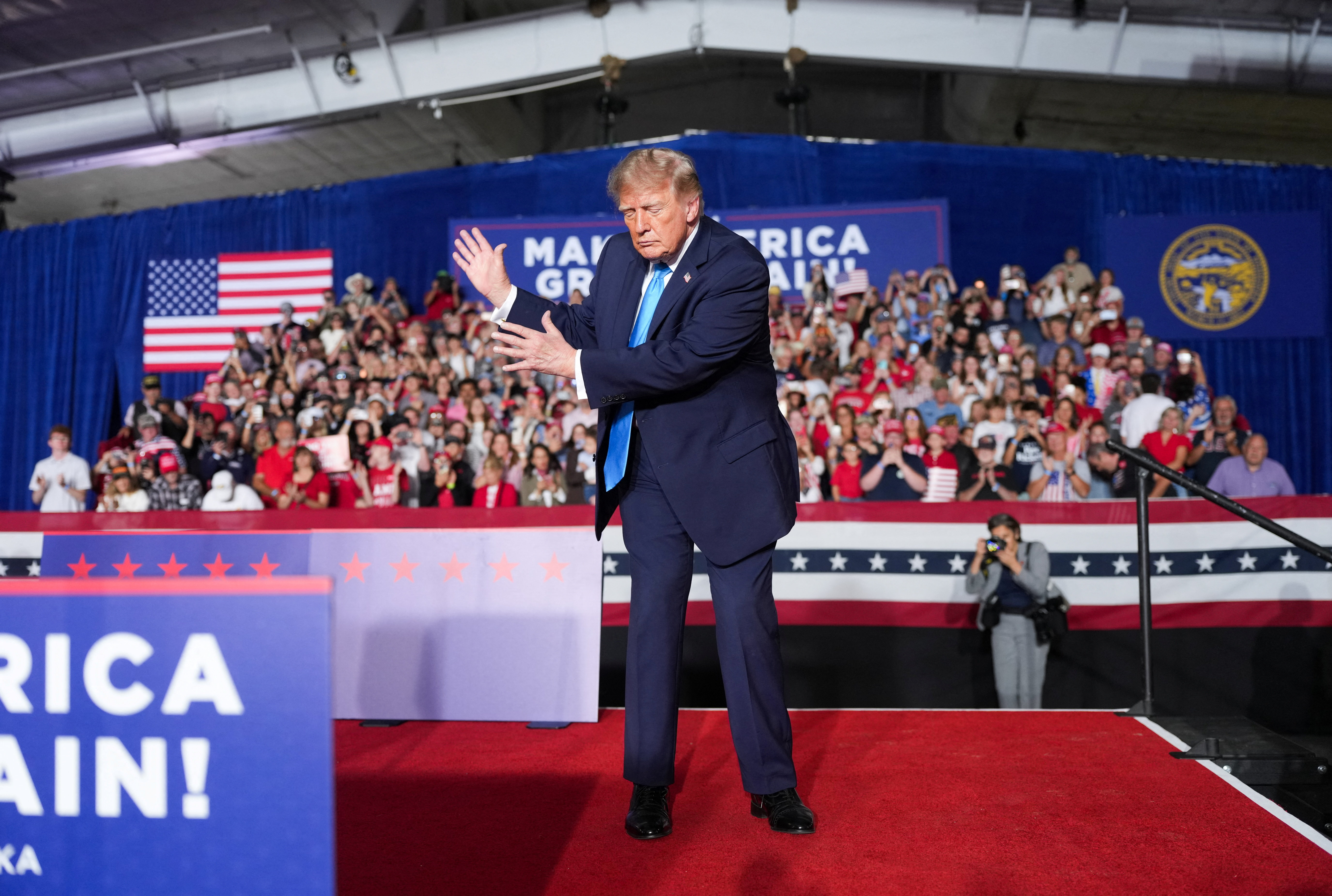 US President Donald Trump dances on stage during a rally at Pinnacle Bank Expo Center in Grand Island, Nebraska, US, October 5, 2026. REUTERS/Nathan Howard