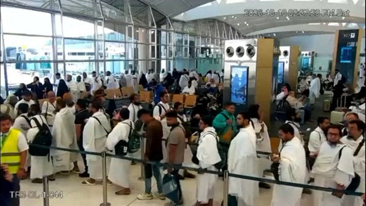 Surveillance footage shows people in a queue right before the moment of an attack at King Khalid International Airport in Riyadh, Saudi Arabia, October 10, 2026, in this screengrab from a handout video. Saudi Ministry of Media/Handout via REUTERS THIS IMAGE HAS BEEN SUPPLIED BY A THIRD PARTY. OVERLAY FROM SOURCE. VERIFICATION: -Location verified from the CCTV of the boarding gate from the infrastructure and furniture that matched the archive and satellite imagery from terminal 3 at King Khalid International Airport -Location of the CCTV that showed the people seated was not verified -Date confirmed with the timestamp on the surveillance footage -Saudi Civil Aviation Authority said the airport operations were suspended after an attack that left many injured on October 10 -No old results were found posted online before October 11