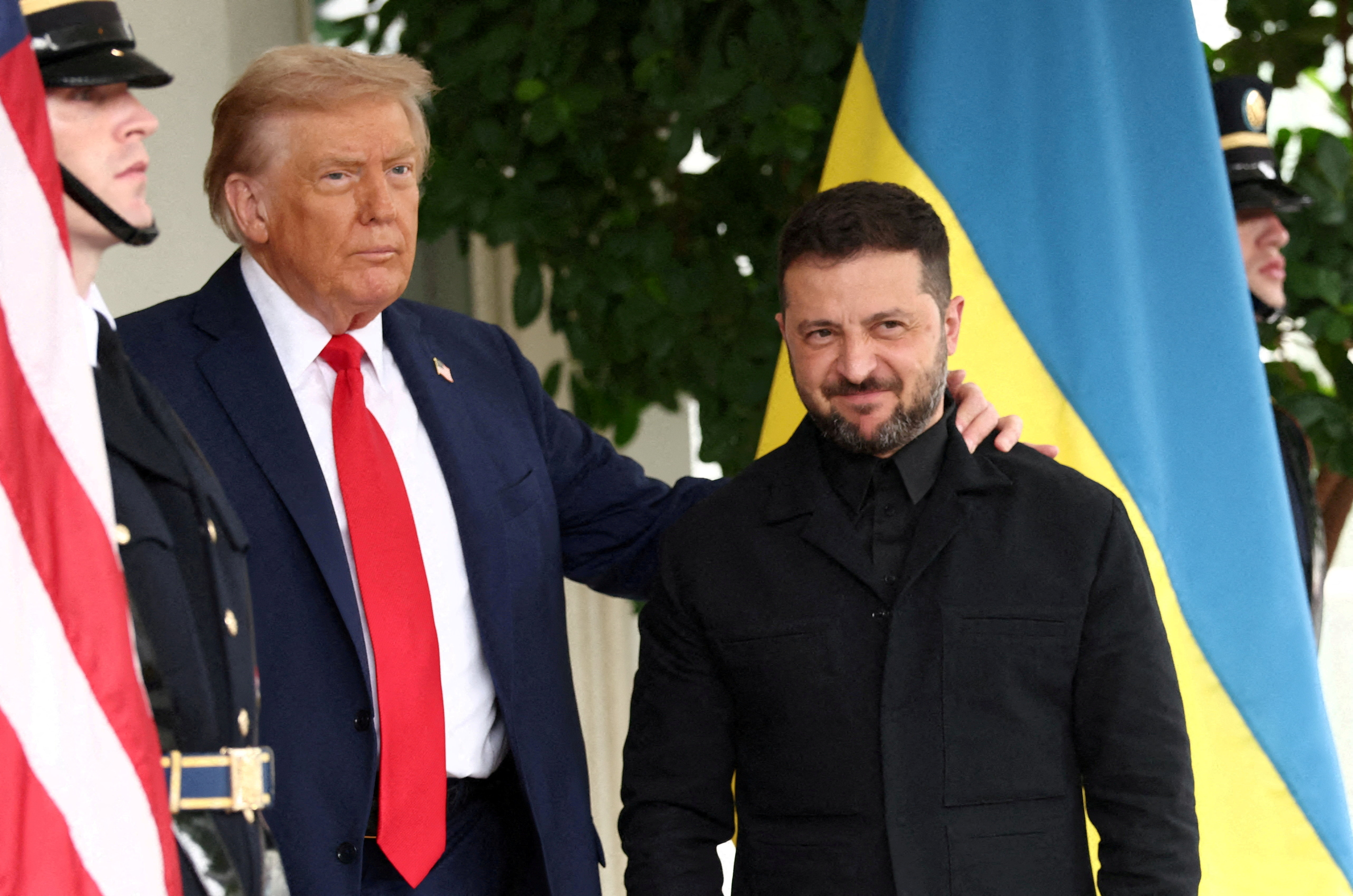 FILE PHOTO: U.S. President Donald Trump greets Ukrainian President Volodymyr Zelenskiy at the White House, amid negotiations to end the Russian war in Ukraine, in Washington, D.C., U.S., August 18, 2025. REUTERS/Kevin Lamarque/File Photo