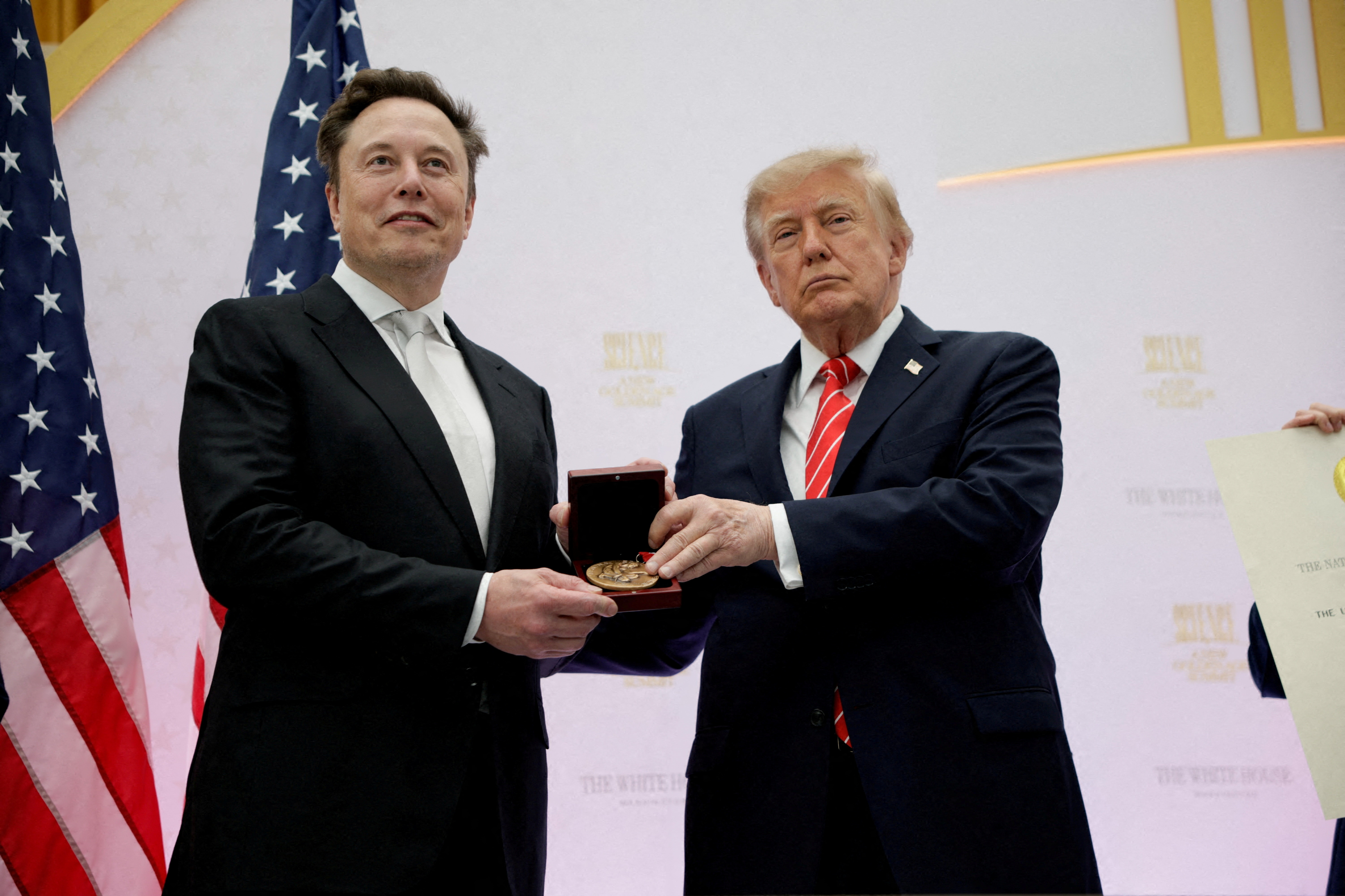 US President Donald Trump presents the National Medal of Science to Tesla and SpaceX CEO Elon Musk