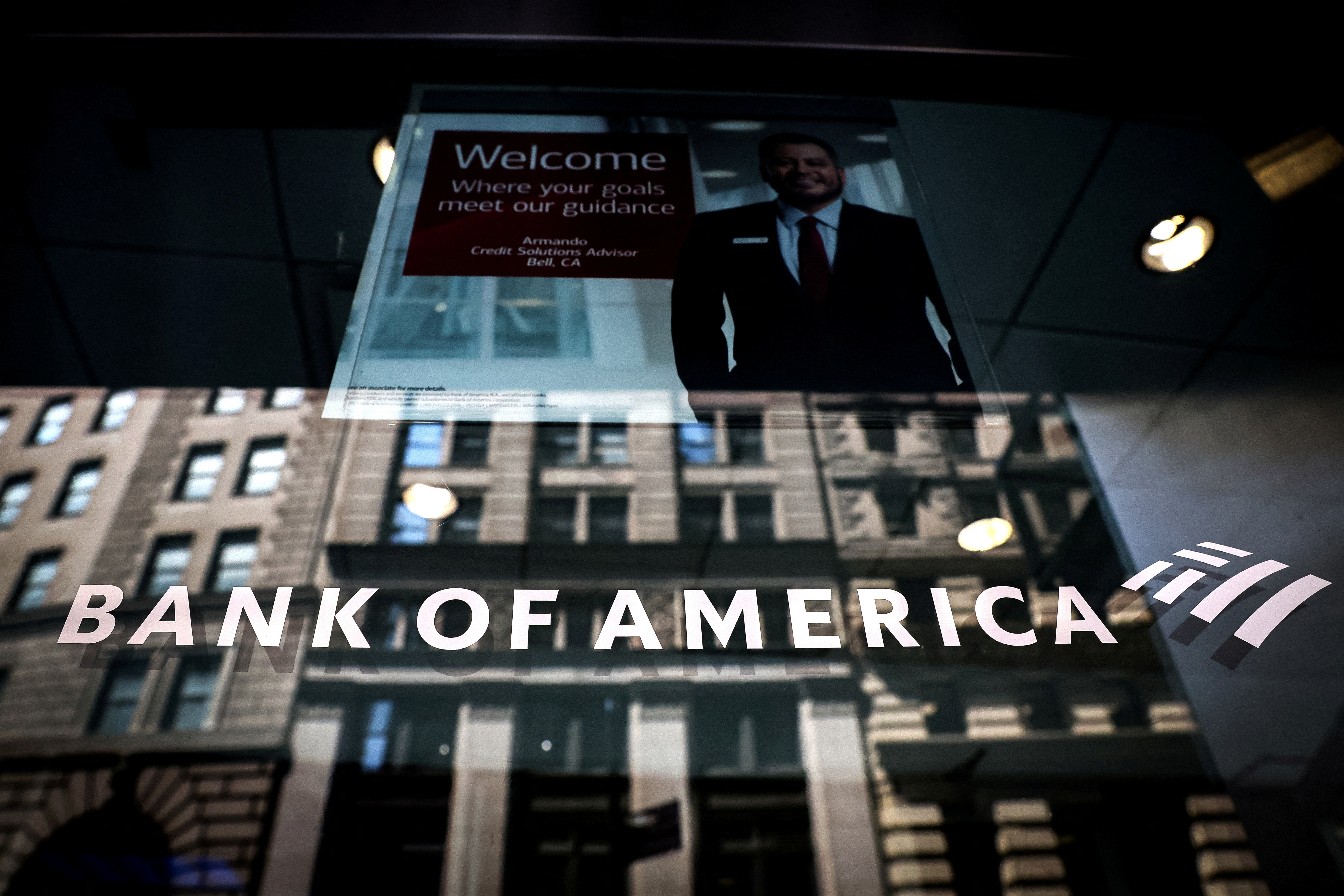FILE PHOTO: A Bank of America logo is seen on the entrance to a Bank of America financial center in New York City, U.S., July 11, 2023. REUTERS/Brendan McDermid/File Photo